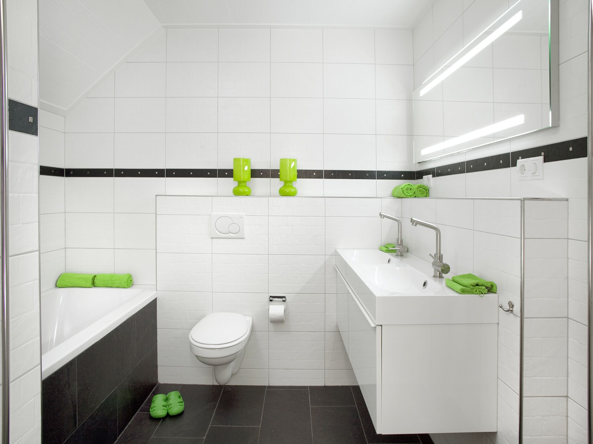 De badkamer van De Familieboerderij in Losser