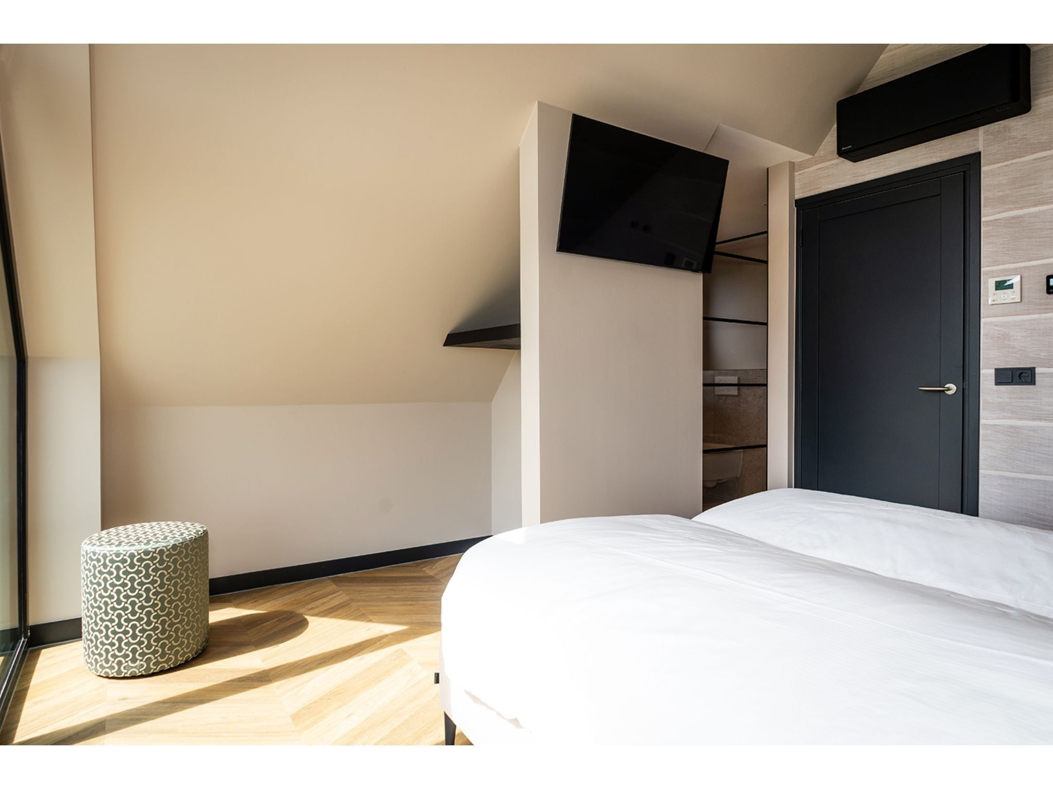 Een slaapkamer van Type N Luxe Villa Zeeburg in De Cocksdorp