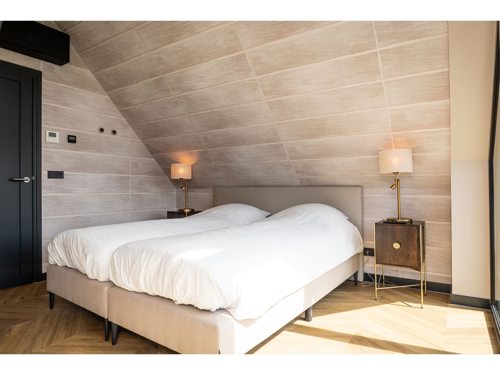 Een slaapkamer van Type N Luxe Villa Zeeburg in De Cocksdorp