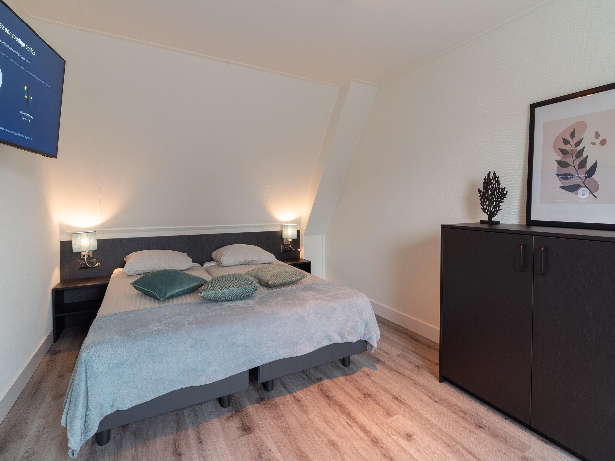 Een slaapkamer van 6 persoons vrijstaand met sauna/hond in Colijnsplaat