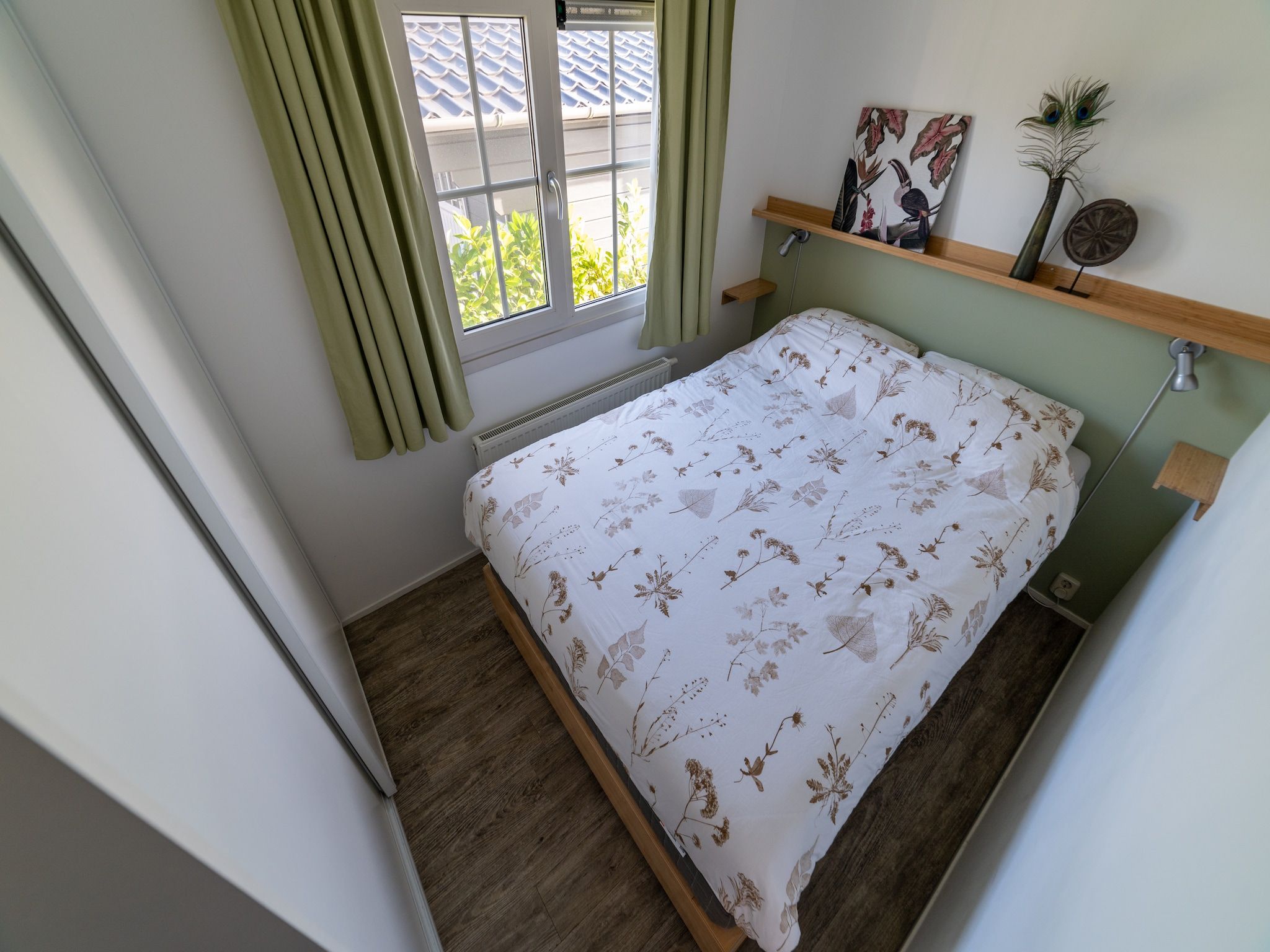 Een slaapkamer van Chalet Resort Venetie Giethoorn in Giethoorn