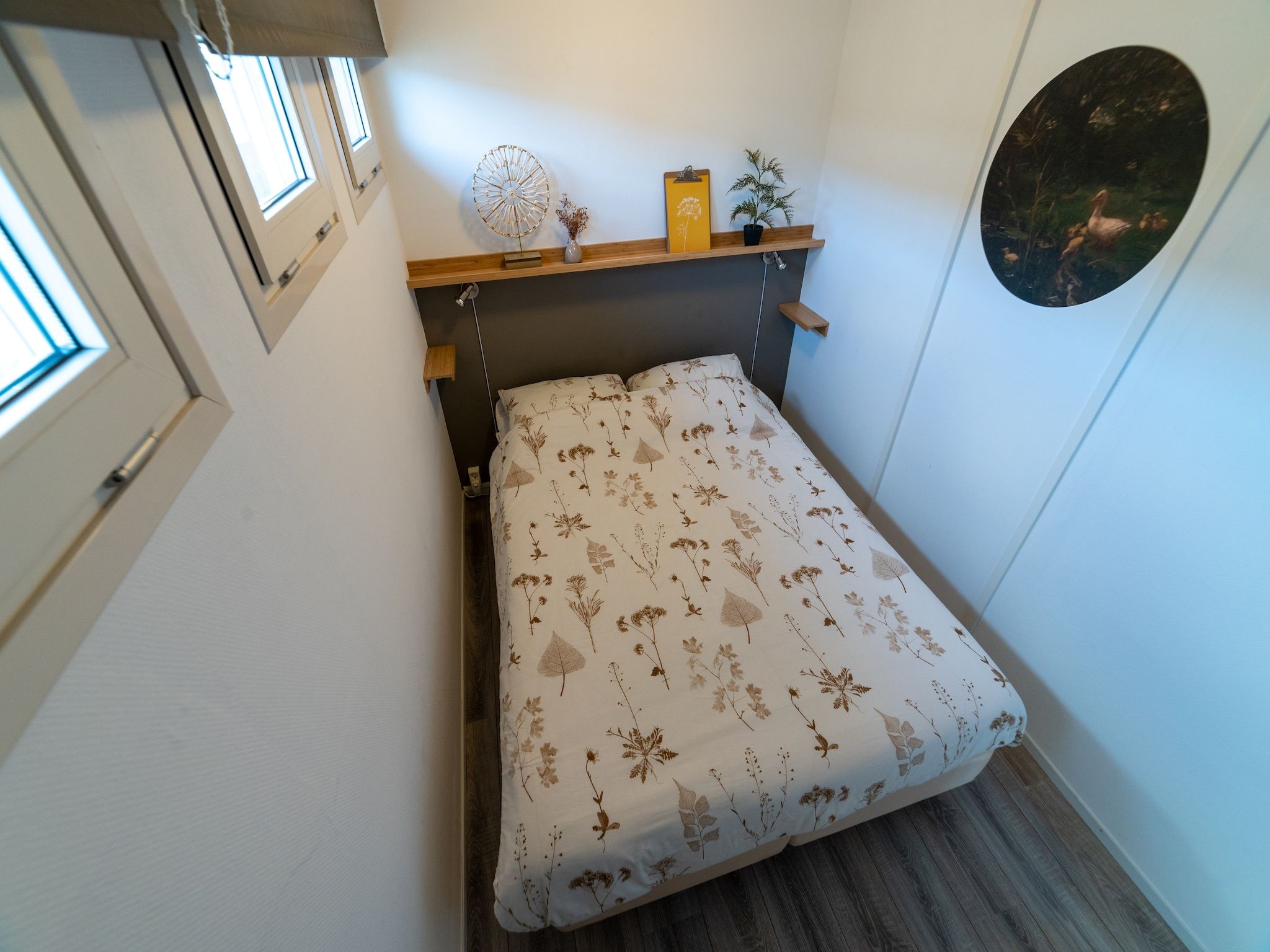 Een slaapkamer van Chalet Resort Venetie Giethoorn in Giethoorn