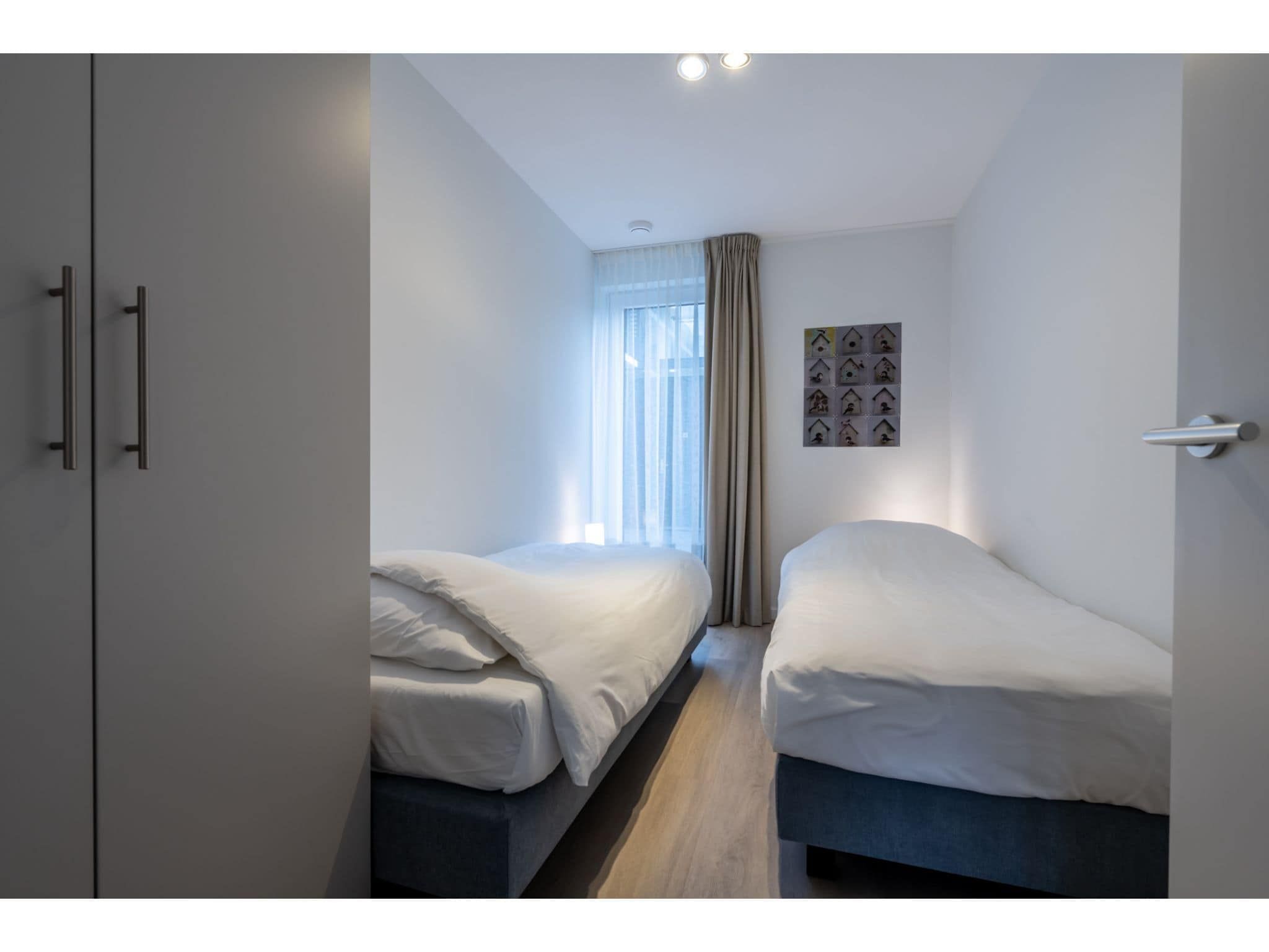 Een slaapkamer van Harbour Loft 1 / Residence Marina 8 pers in Kamperland