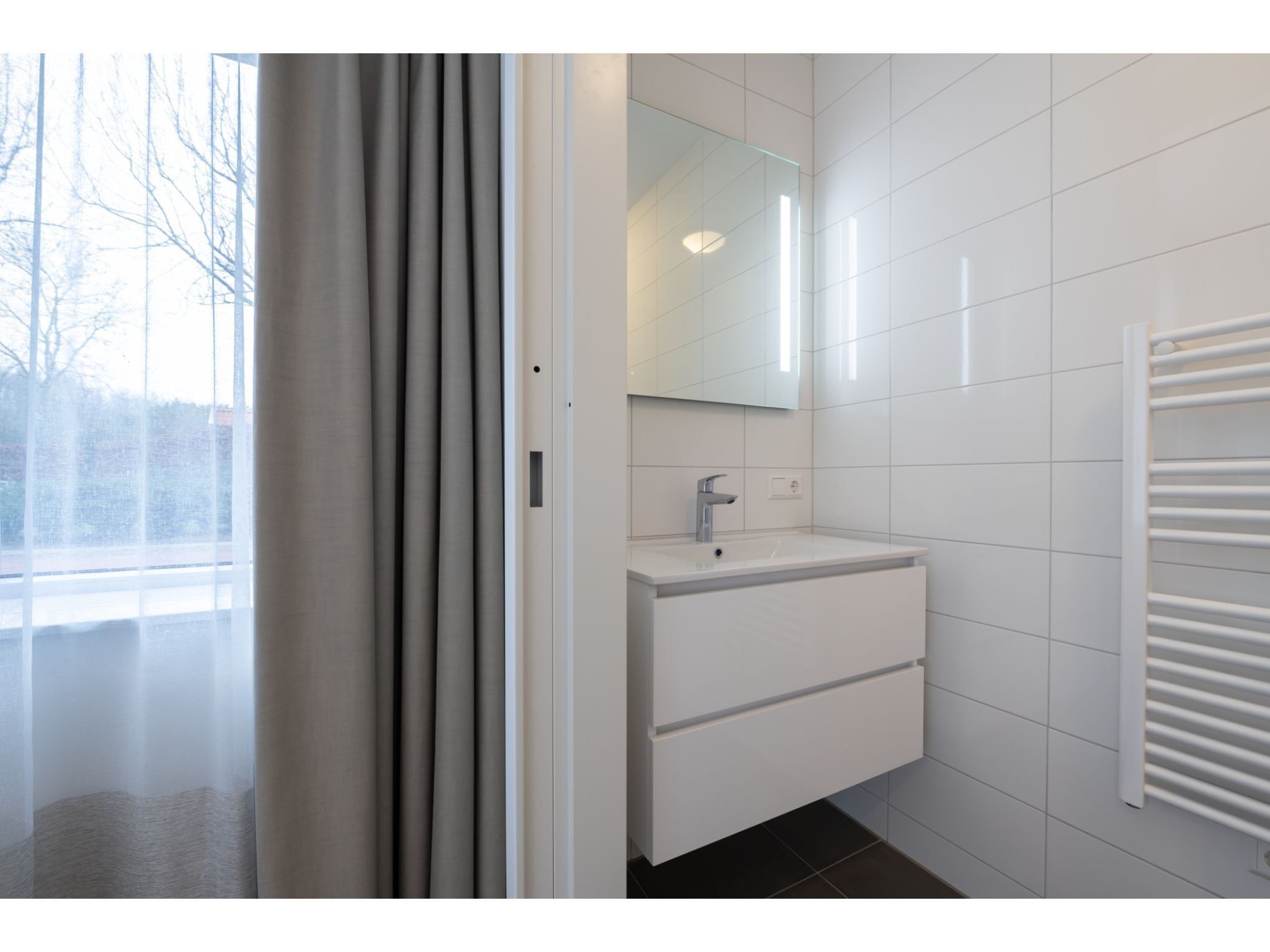 De badkamer van Harbour Loft 1 / Residence Marina 8 pers in Kamperland