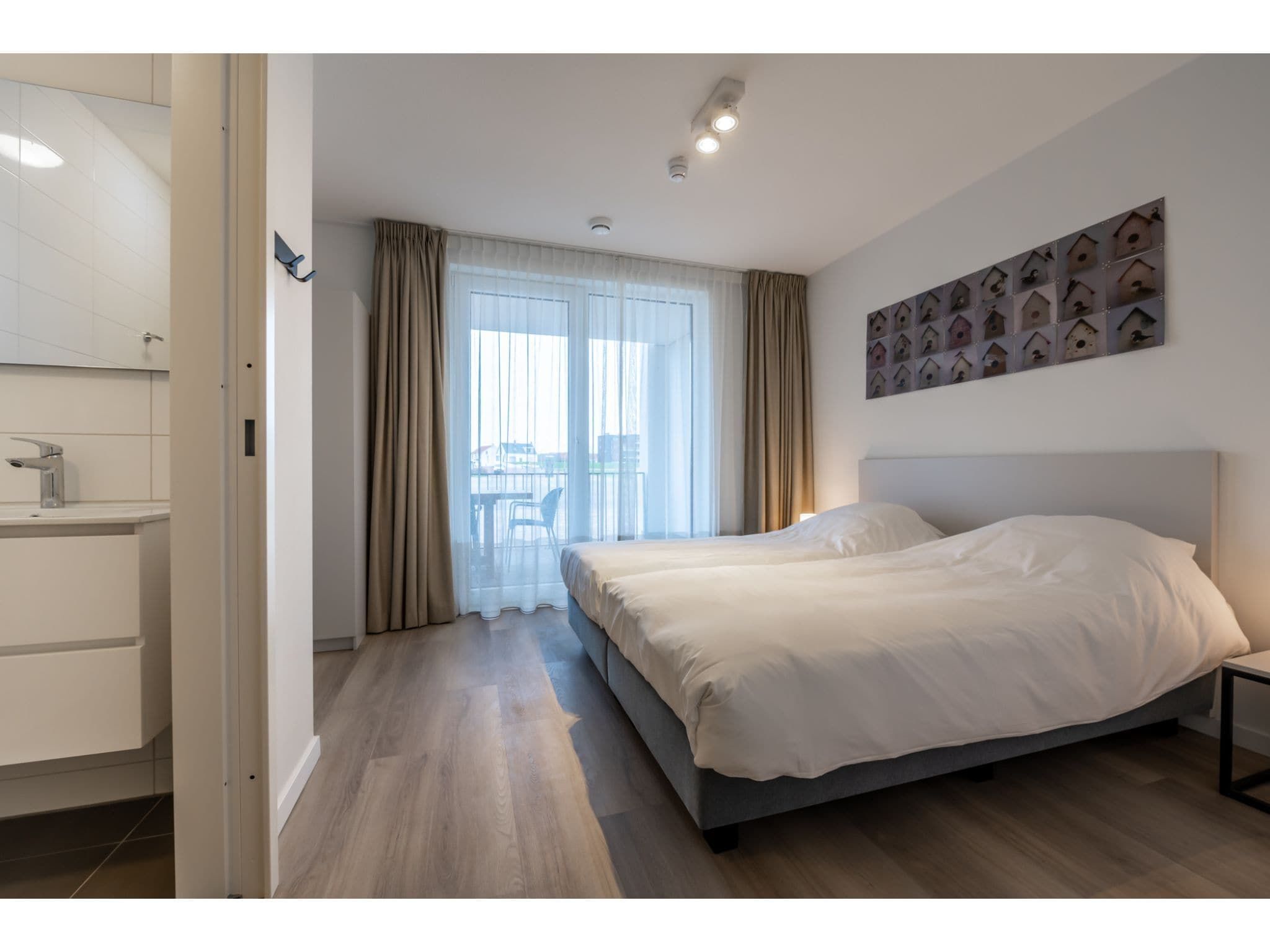 Een slaapkamer van Harbour Loft 1 / Residence Marina 8 pers in Kamperland