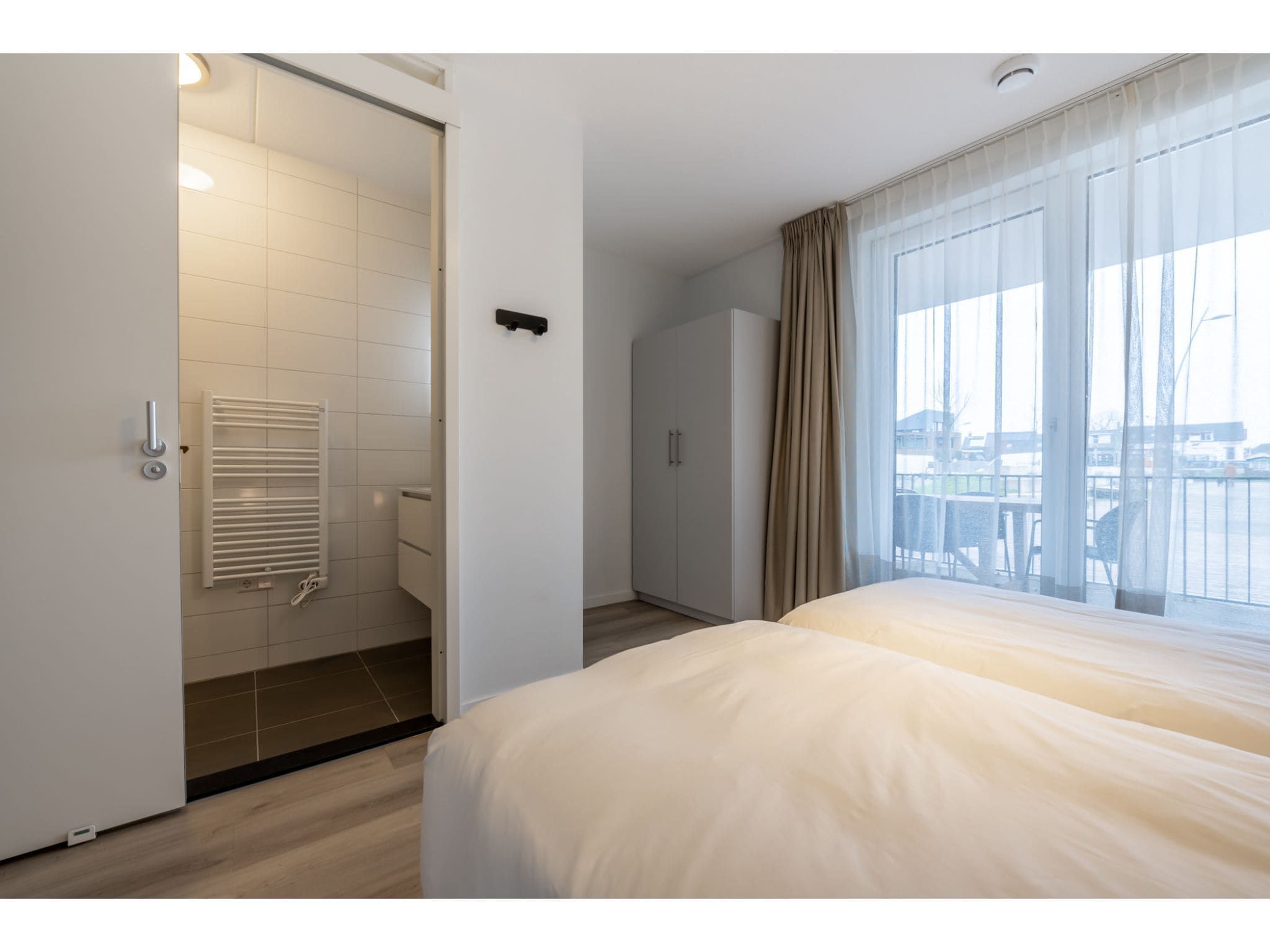 Een slaapkamer van Harbour Loft 1 / Residence Marina 8 pers in Kamperland