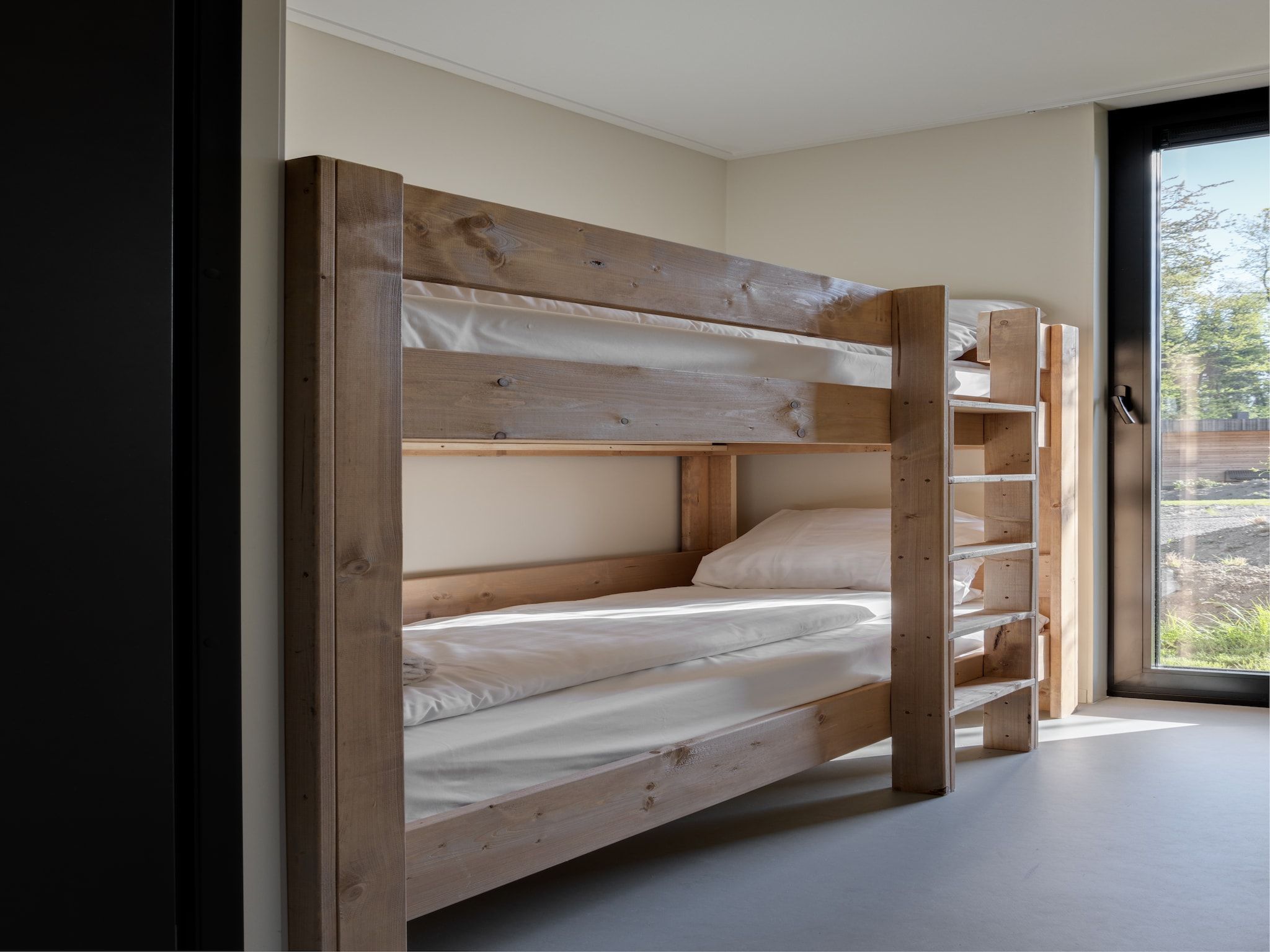 Een slaapkamer van Resort de Parel 5 in Zeewolde