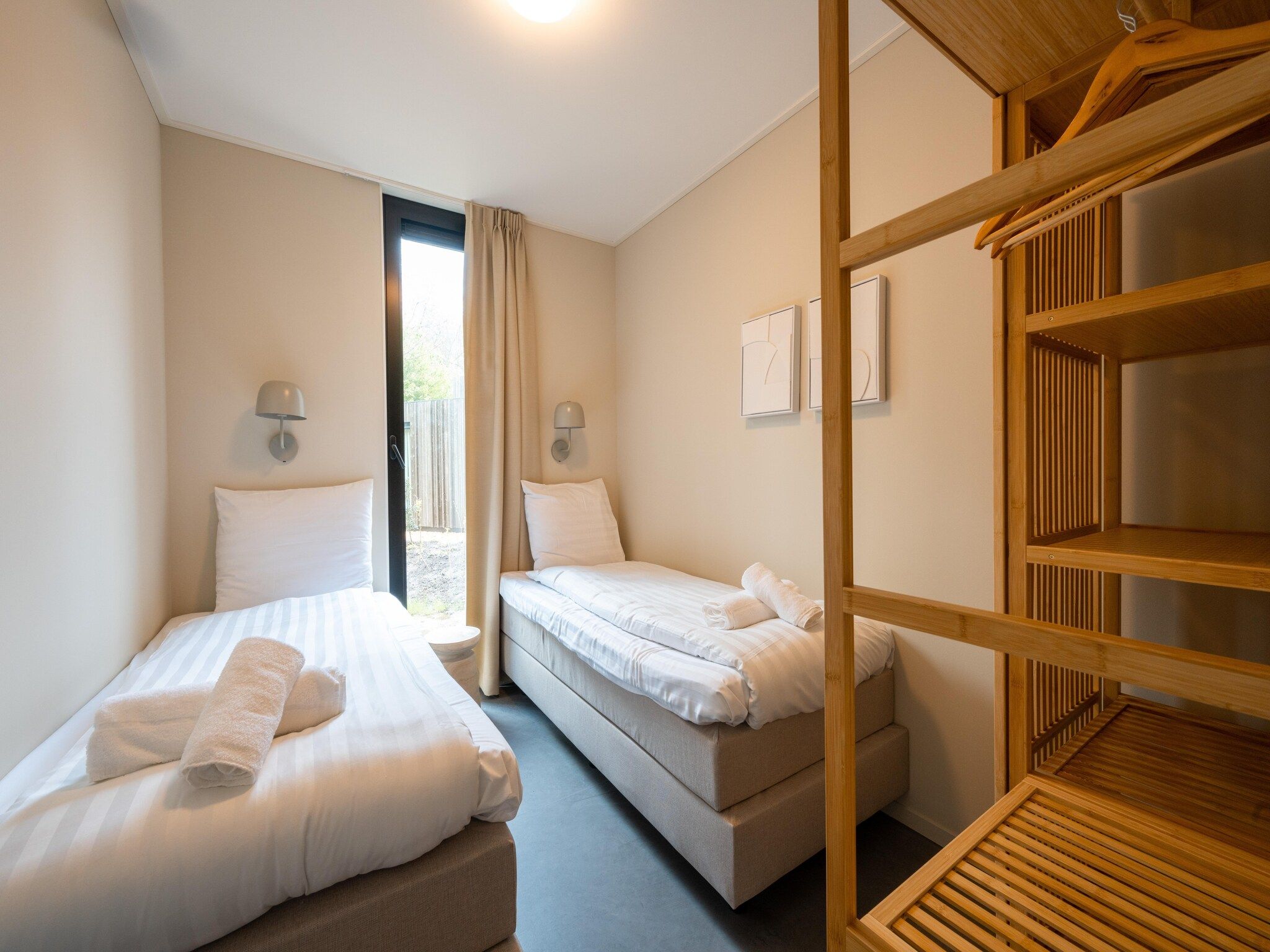 Een slaapkamer van Resort de Parel 9 in Zeewolde