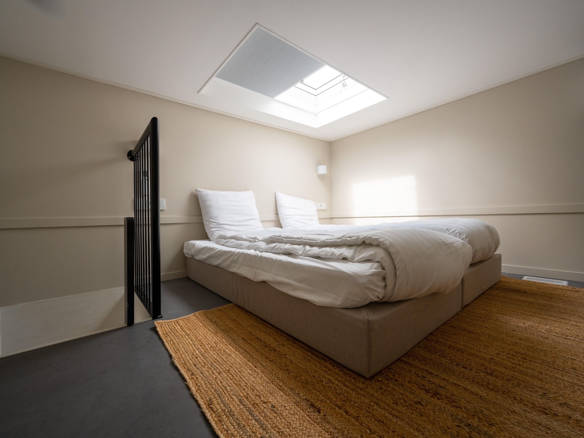 Een slaapkamer van Resort de Parel 9 in Zeewolde