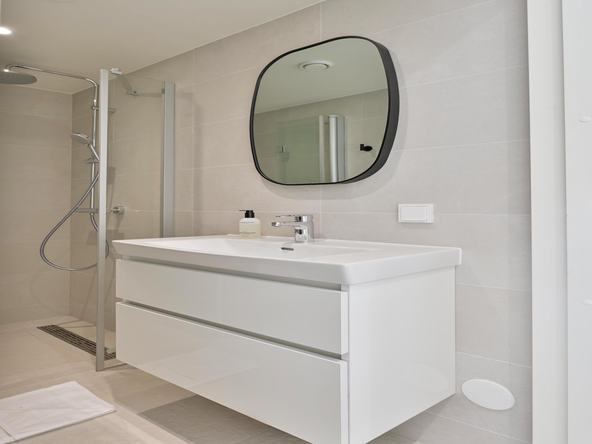 De badkamer van Resort de Parel 14 in Zeewolde