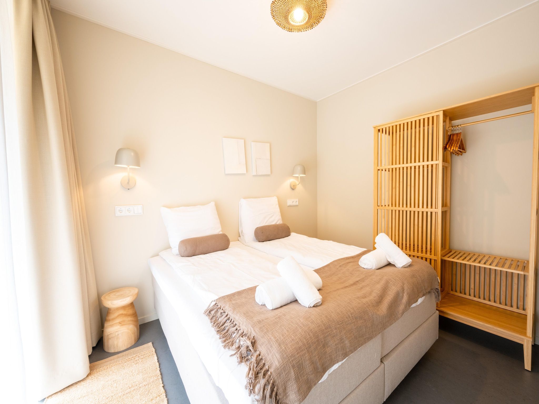 Een slaapkamer van Resort de Parel 14 in Zeewolde