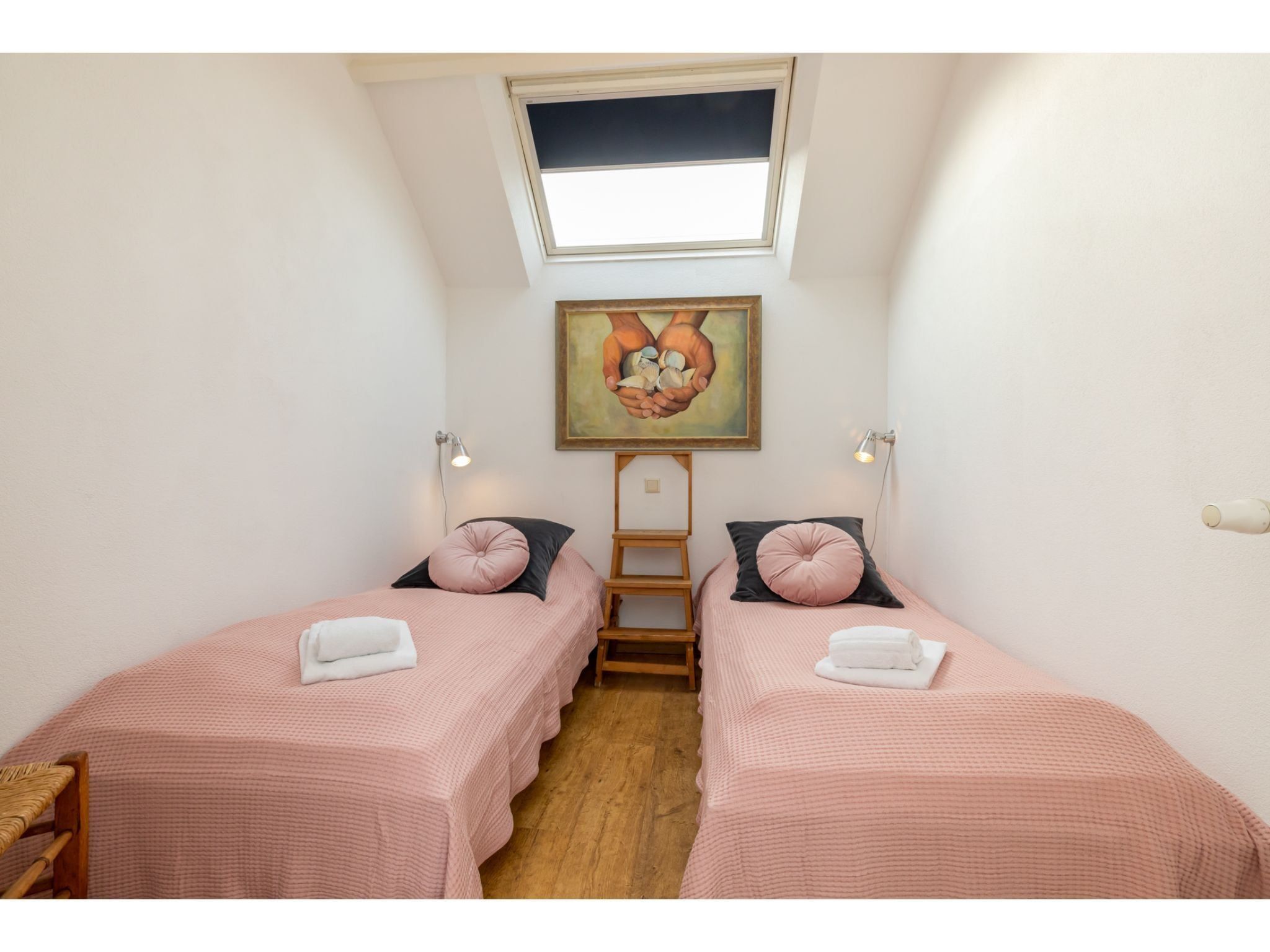 Een slaapkamer van Bovenappartement - Zuidstraat 111a in Westkapelle