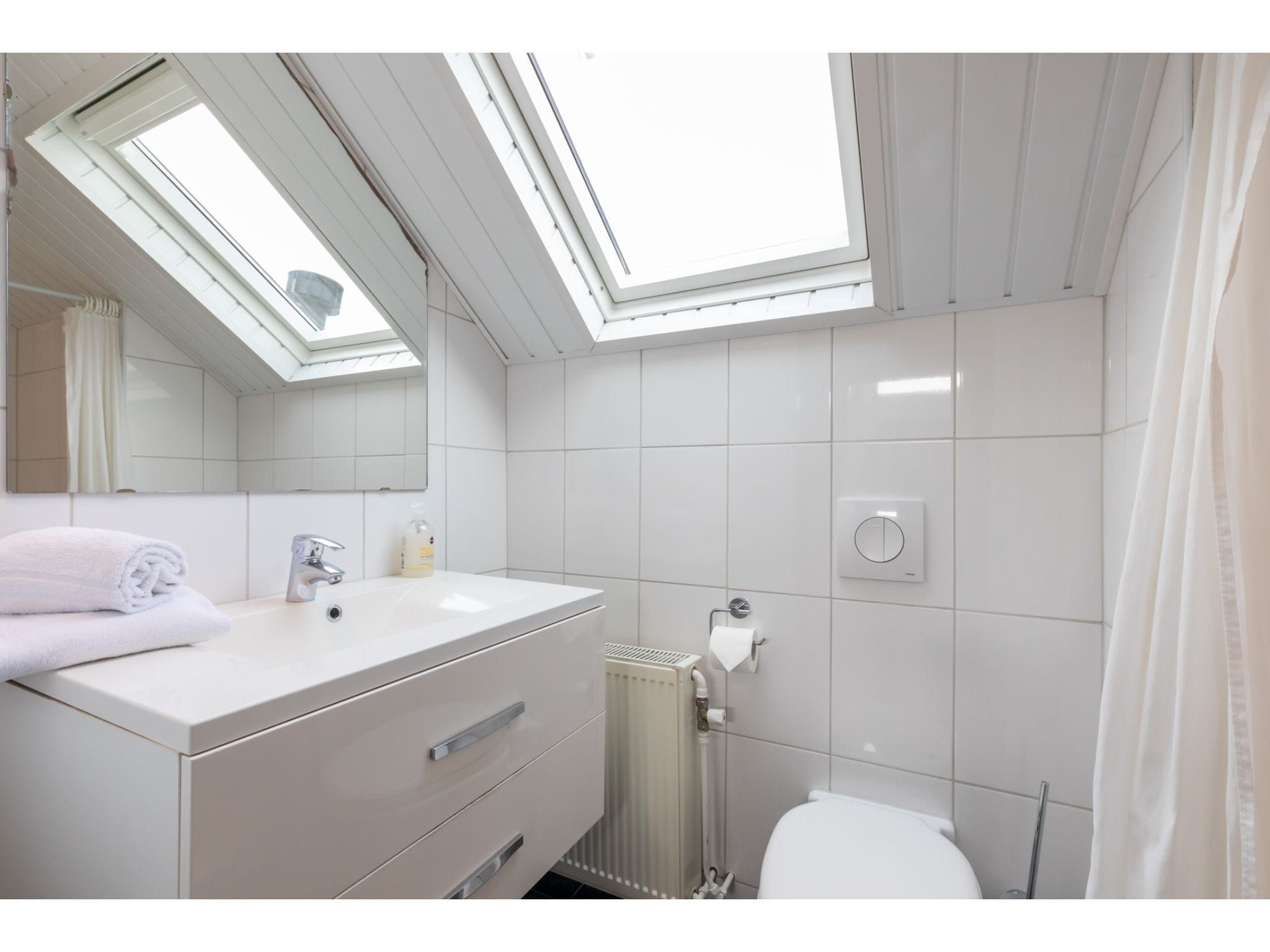 De badkamer van Bovenappartement - Zuidstraat 111a in Westkapelle