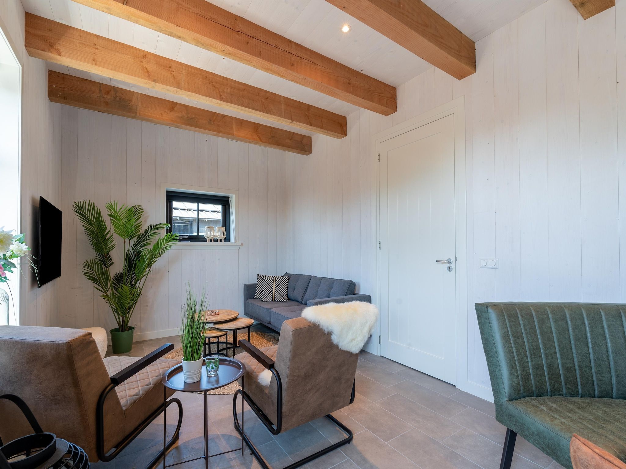 De woonkamer van Hazenborgh - Wagenboet in Callantsoog