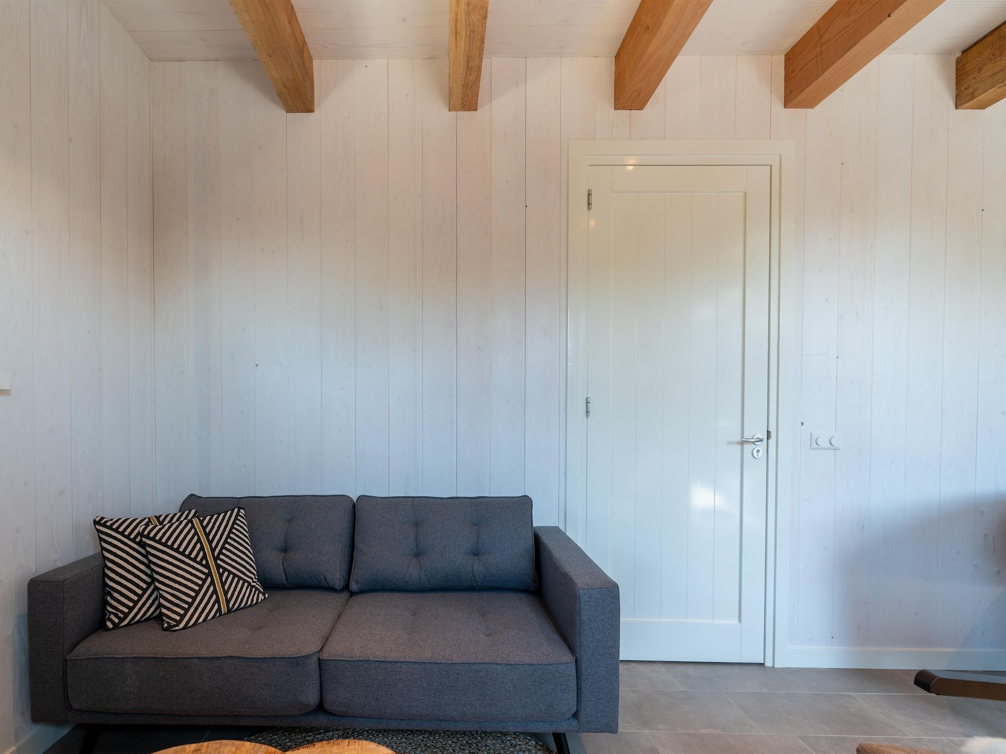 De woonkamer van Hazenborgh - Wagenboet in Callantsoog