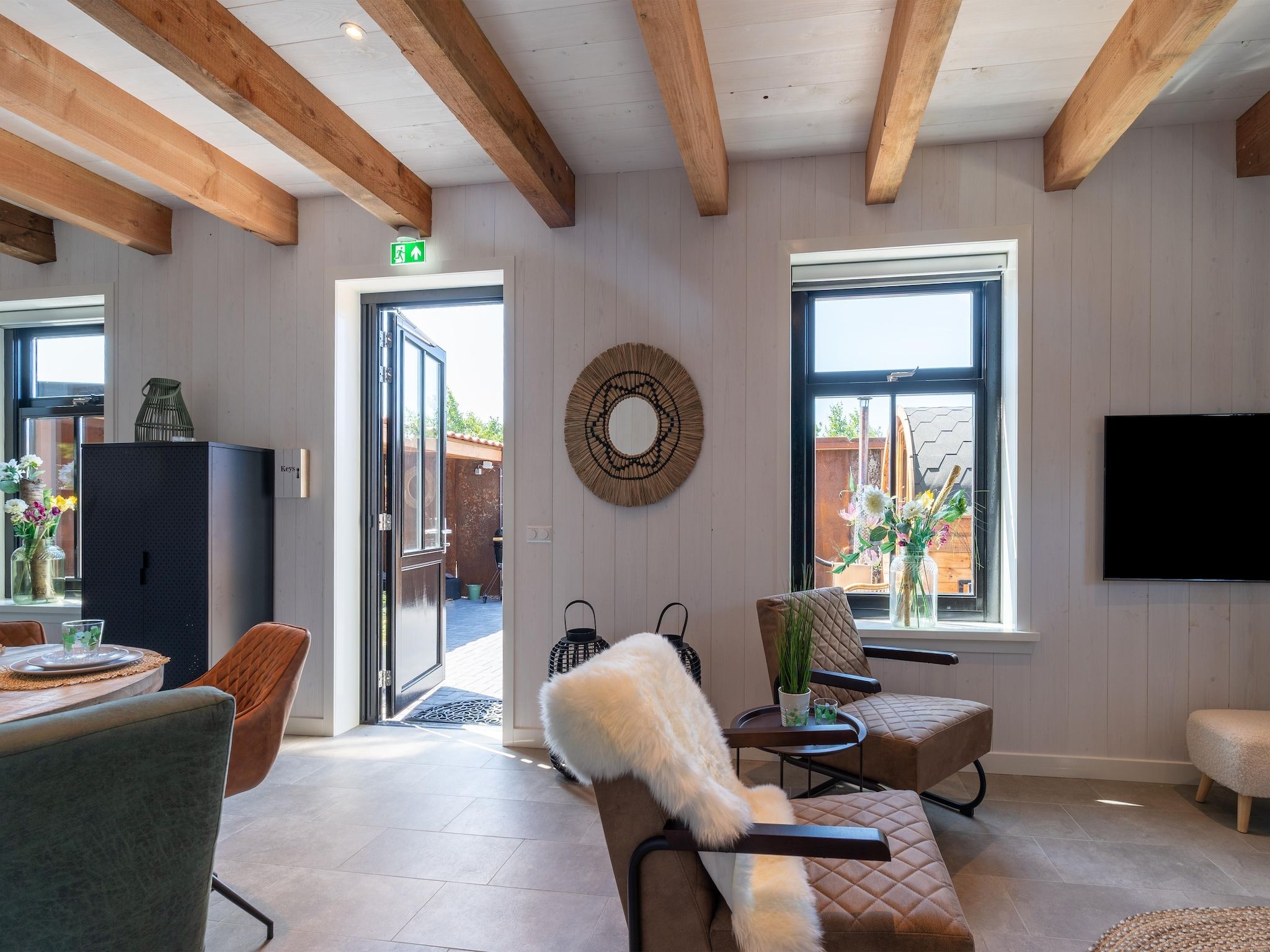 De woonkamer van Hazenborgh - Wagenboet in Callantsoog