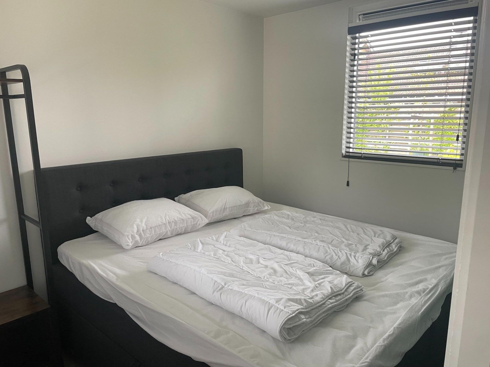 Een slaapkamer van Recreatiepark Idskenhuizen 11 in Idskenhuizen