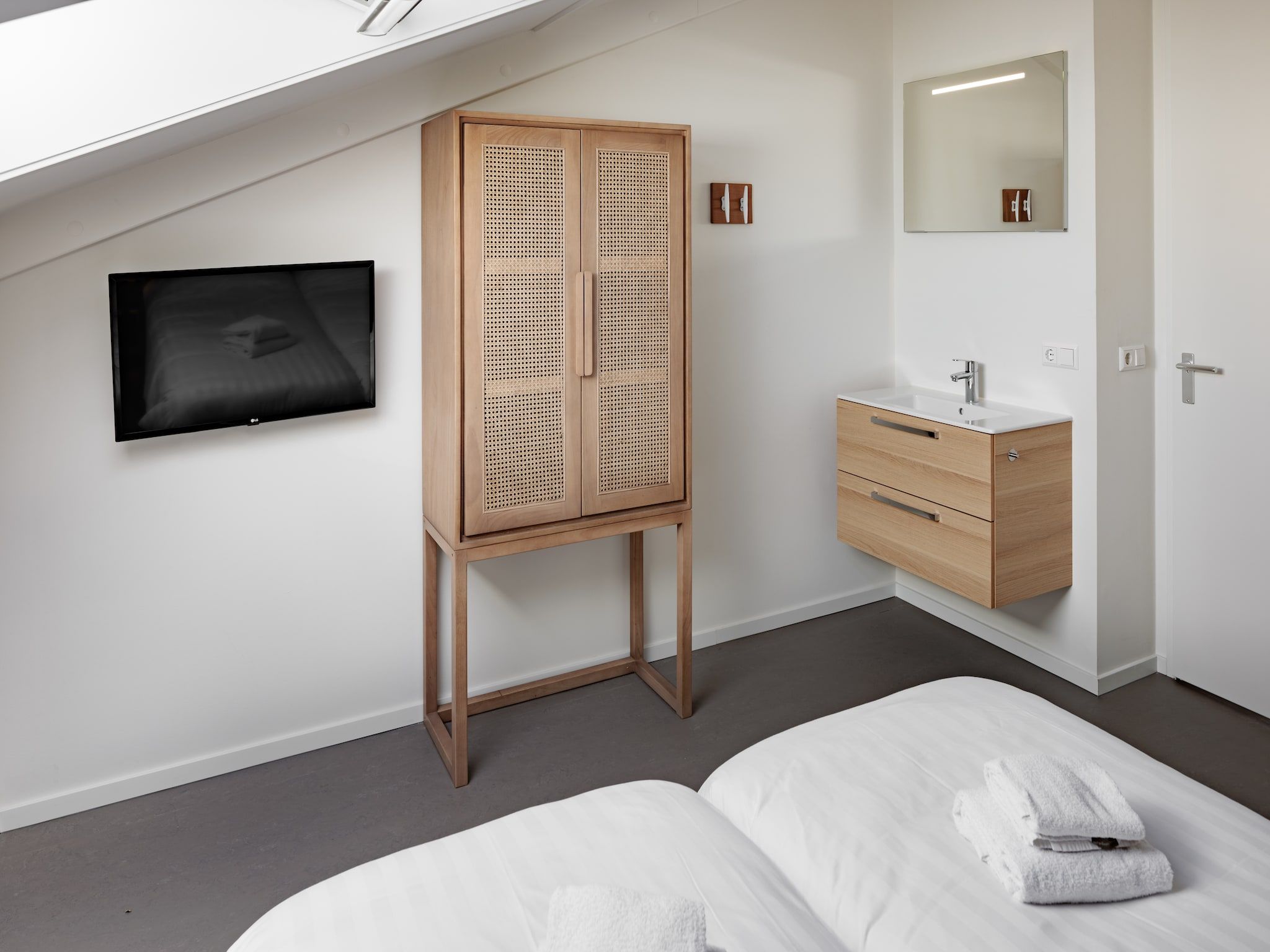 Een slaapkamer van Duinresort Dunimar 5 in Noordwijkerhout