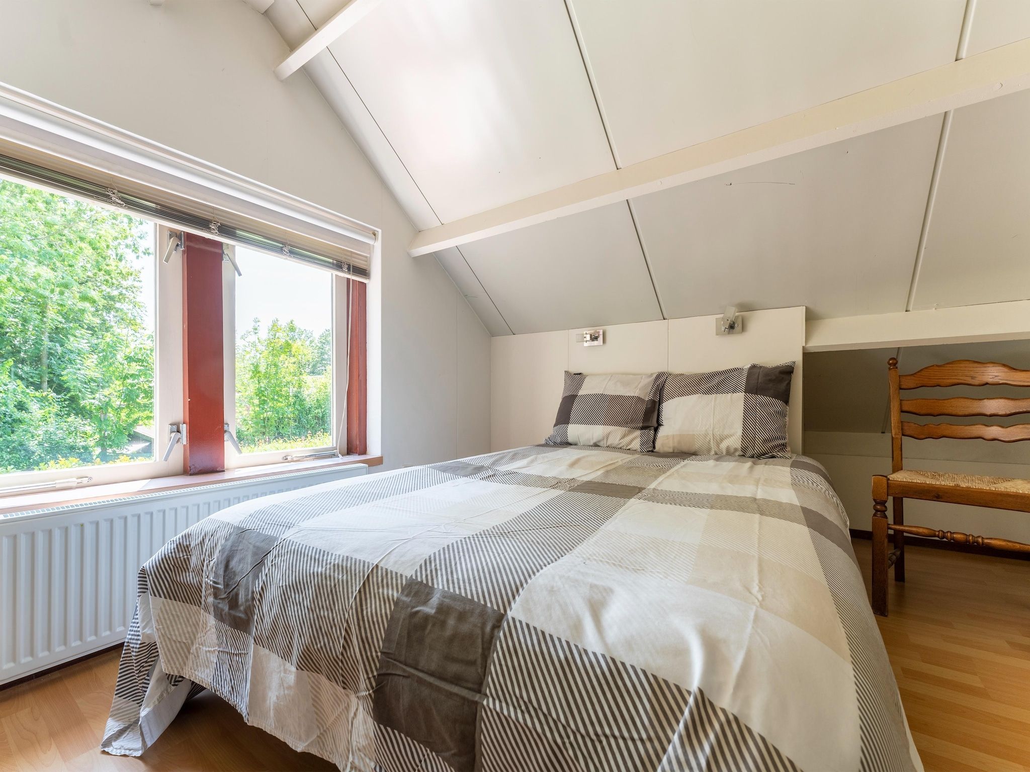 Een slaapkamer van Landingsweg 80 in Baarland