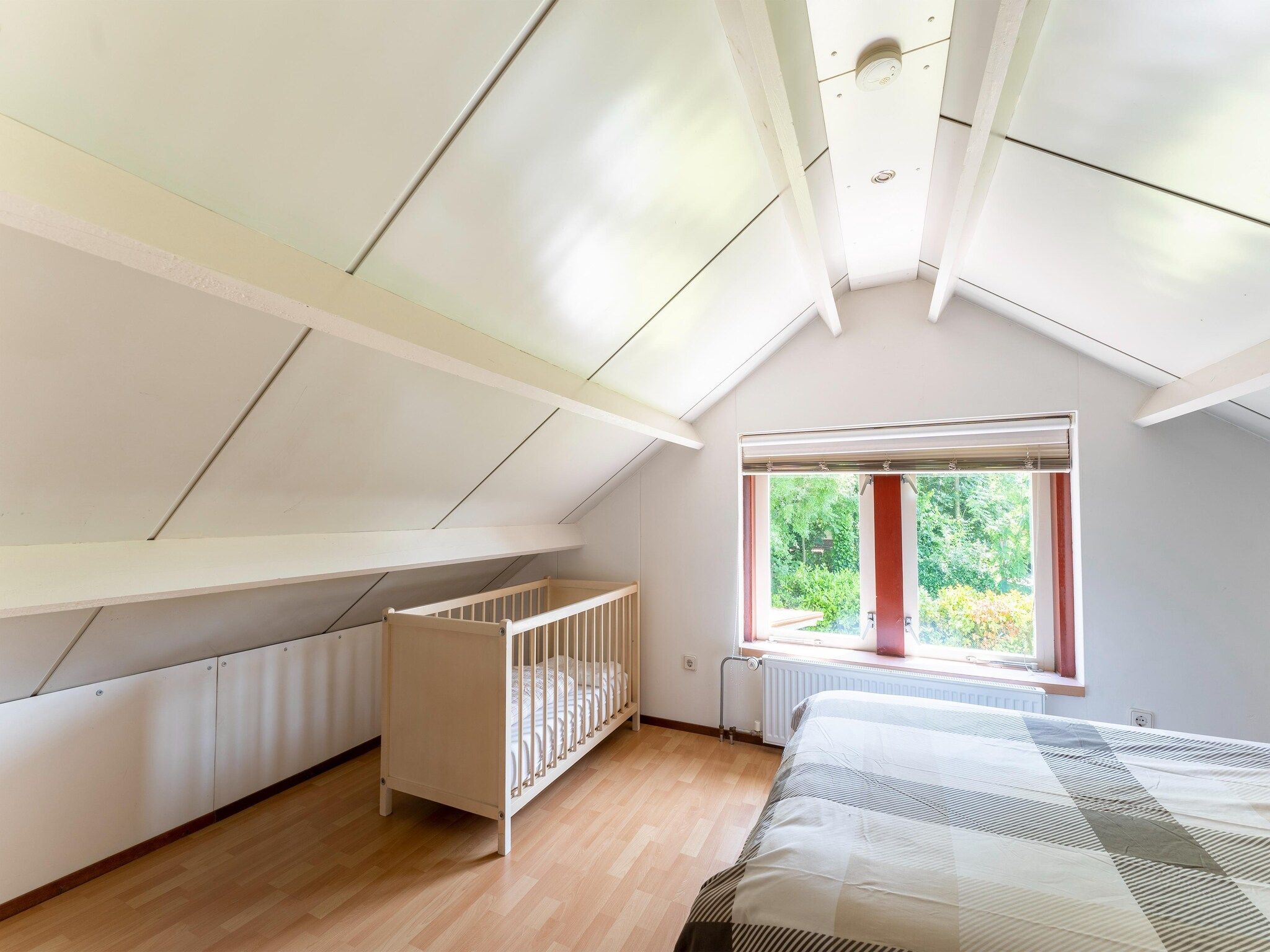 Een slaapkamer van Landingsweg 80 in Baarland