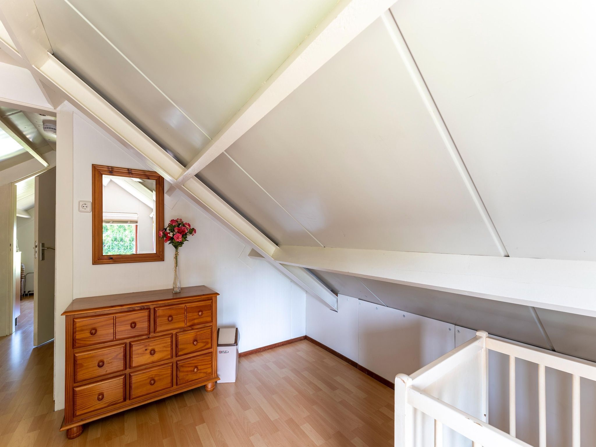 Een slaapkamer van Landingsweg 80 in Baarland