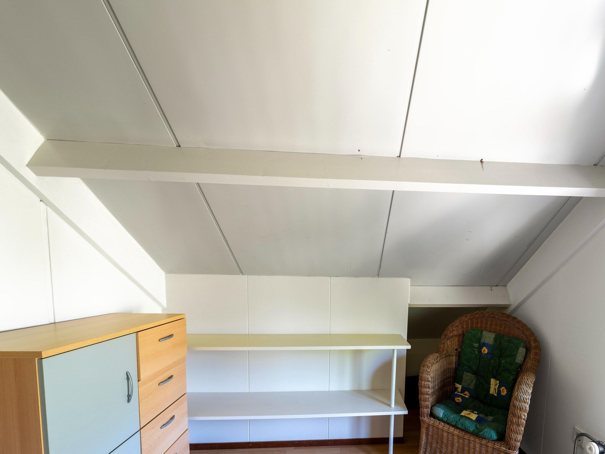 Een slaapkamer van Landingsweg 80 in Baarland