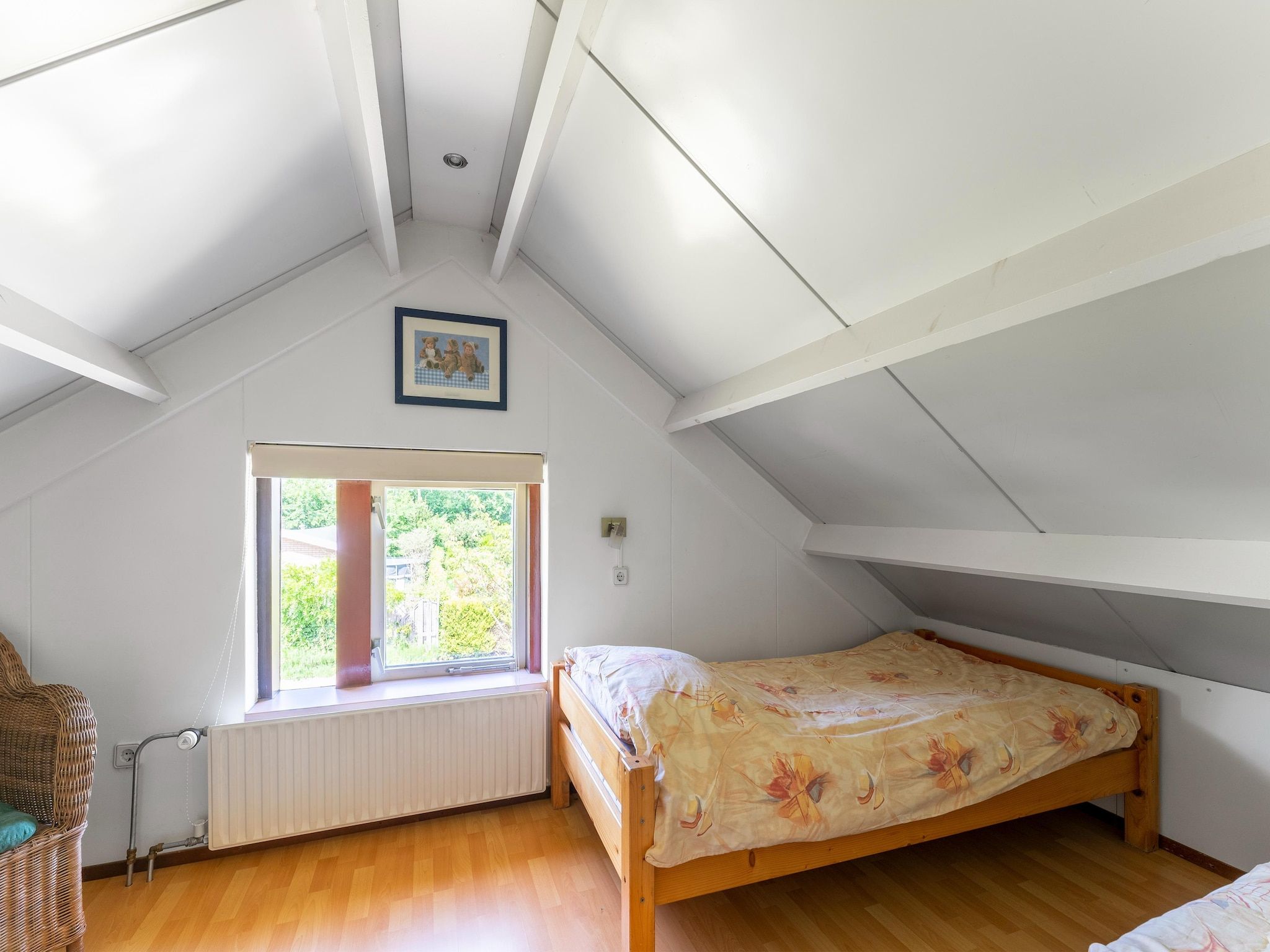 Een slaapkamer van Landingsweg 80 in Baarland