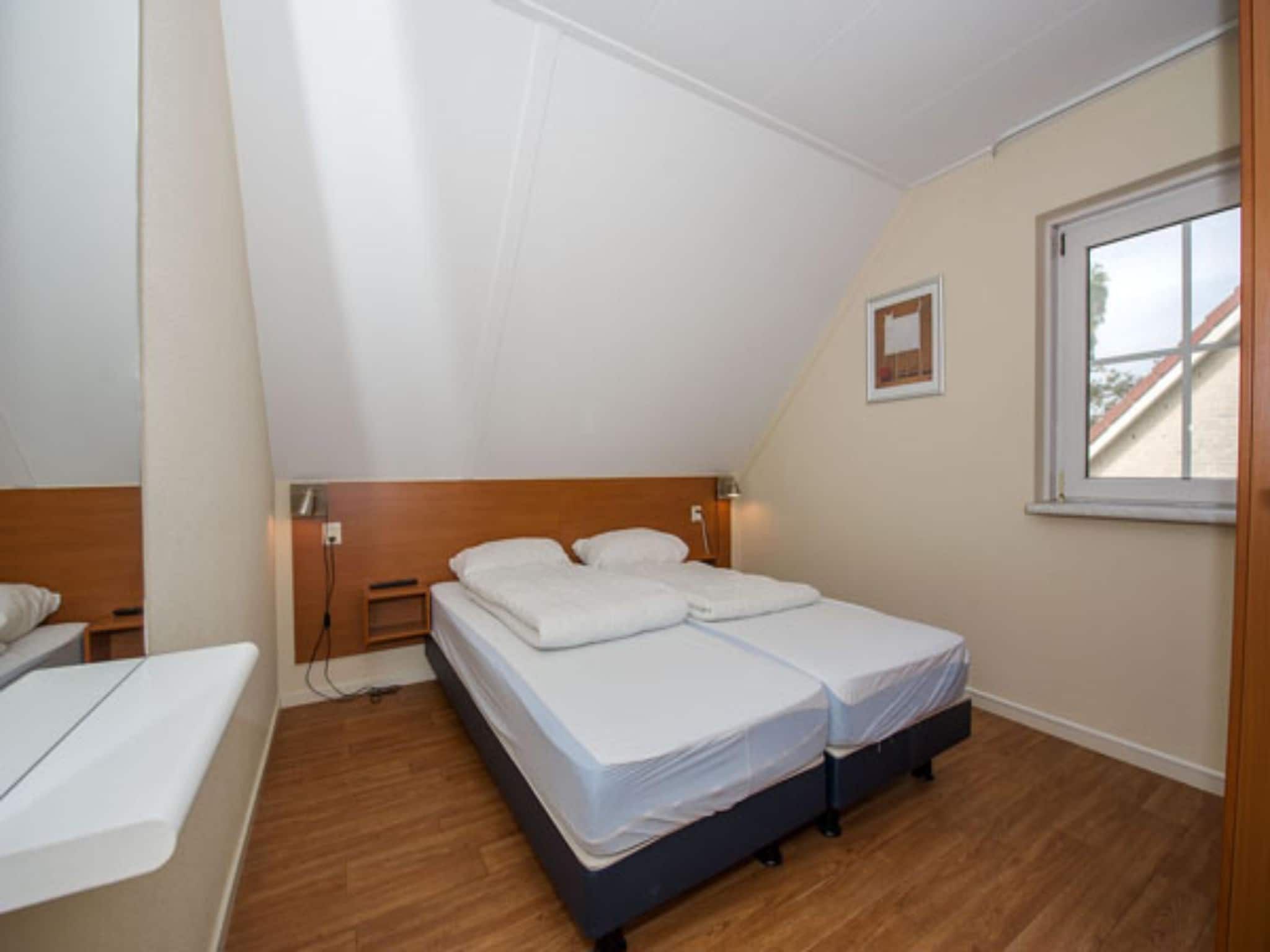 Een slaapkamer van Vakantiepark Hellendoorn 3 in Hellendoorn