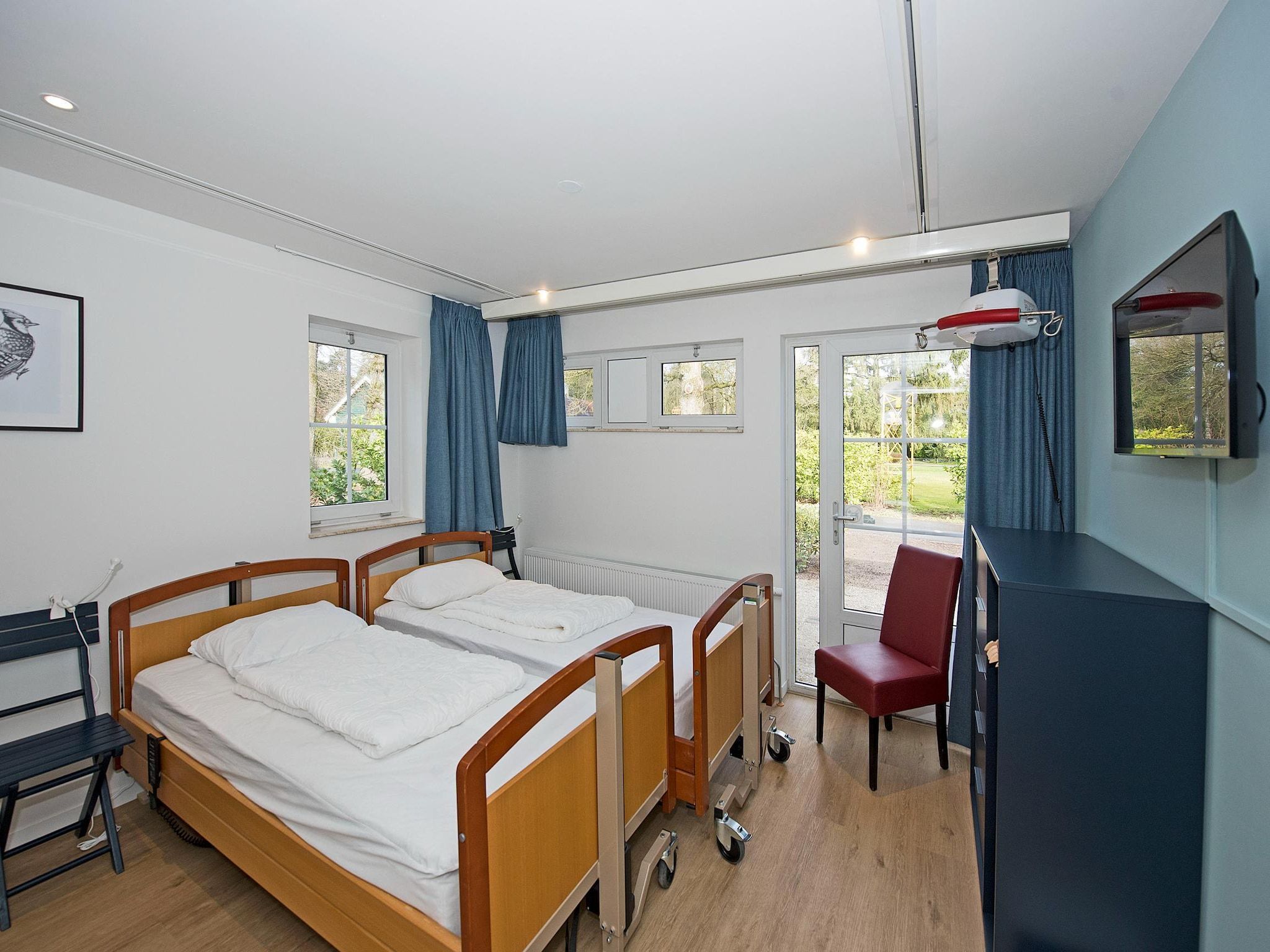 Een slaapkamer van Vakantiepark Hellendoorn 4 in Hellendoorn