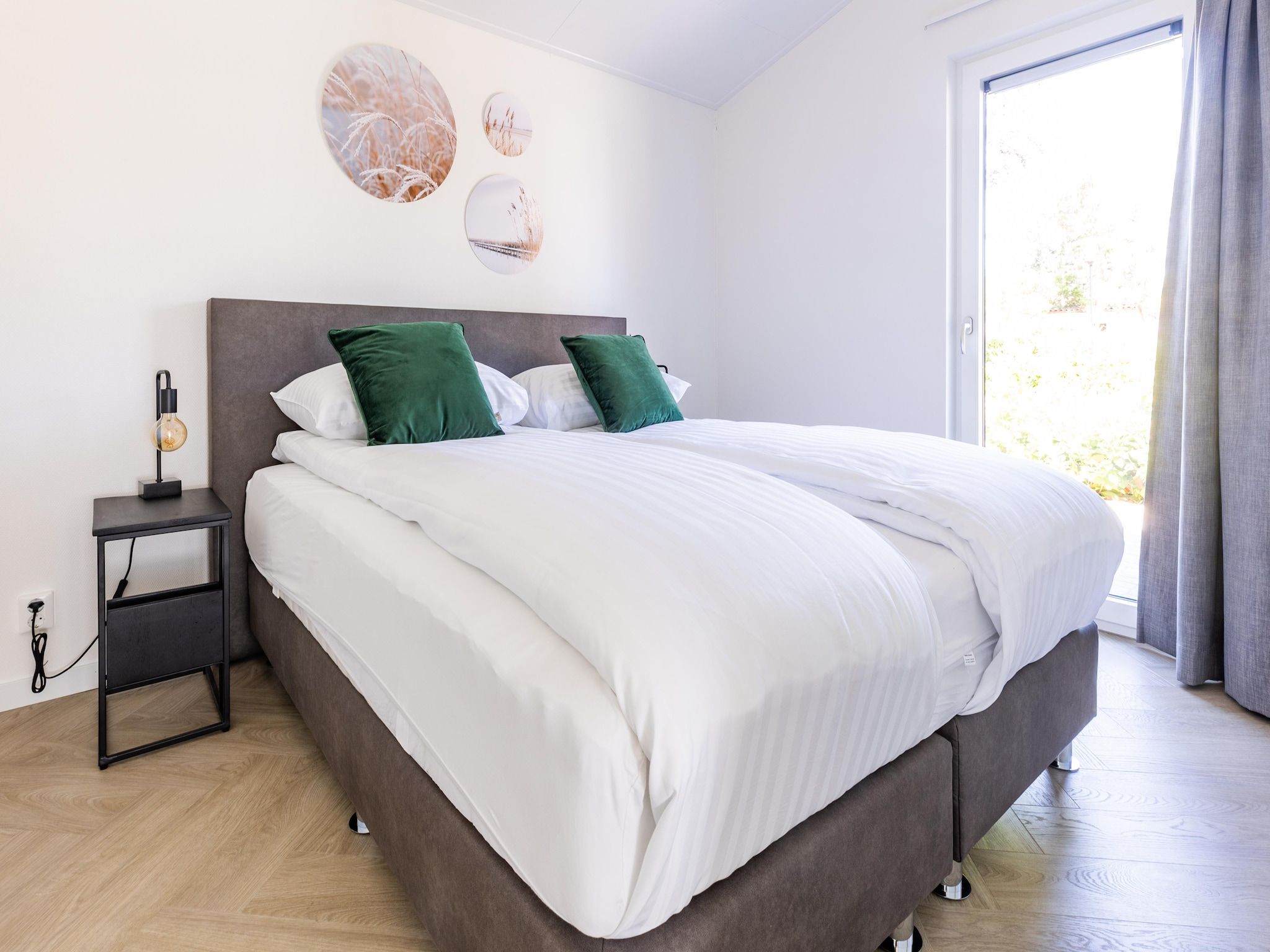 Een slaapkamer van Vakantiepark Molenvelden 8 in Veldhoven