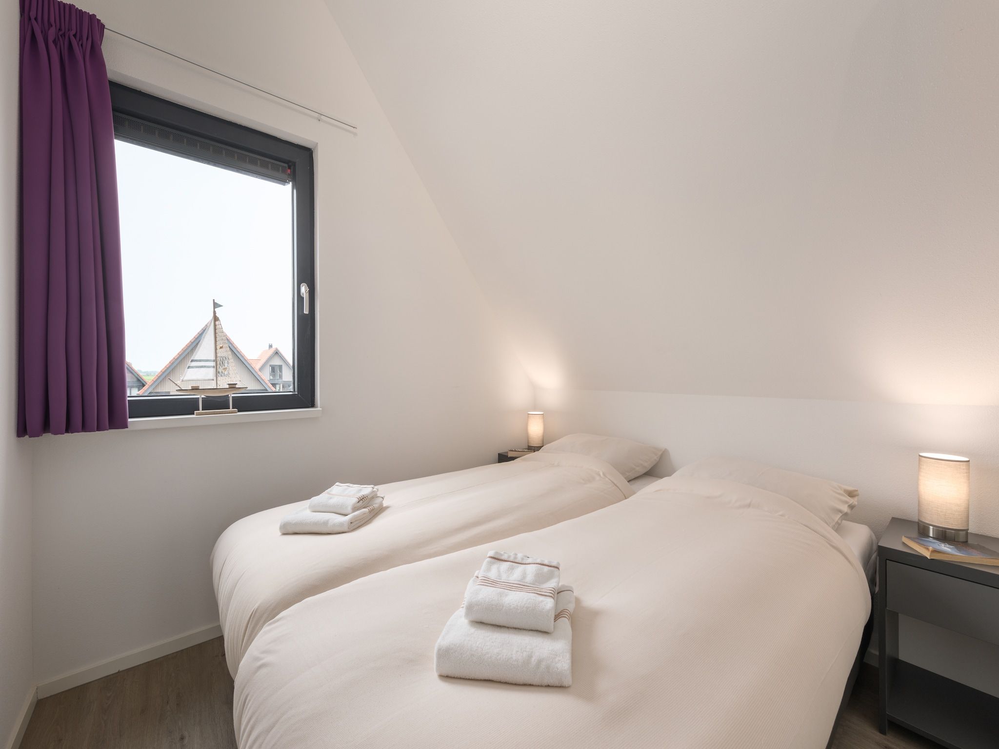 Een slaapkamer van Waterstaete Ossenzijl 4 in Ossenzijl