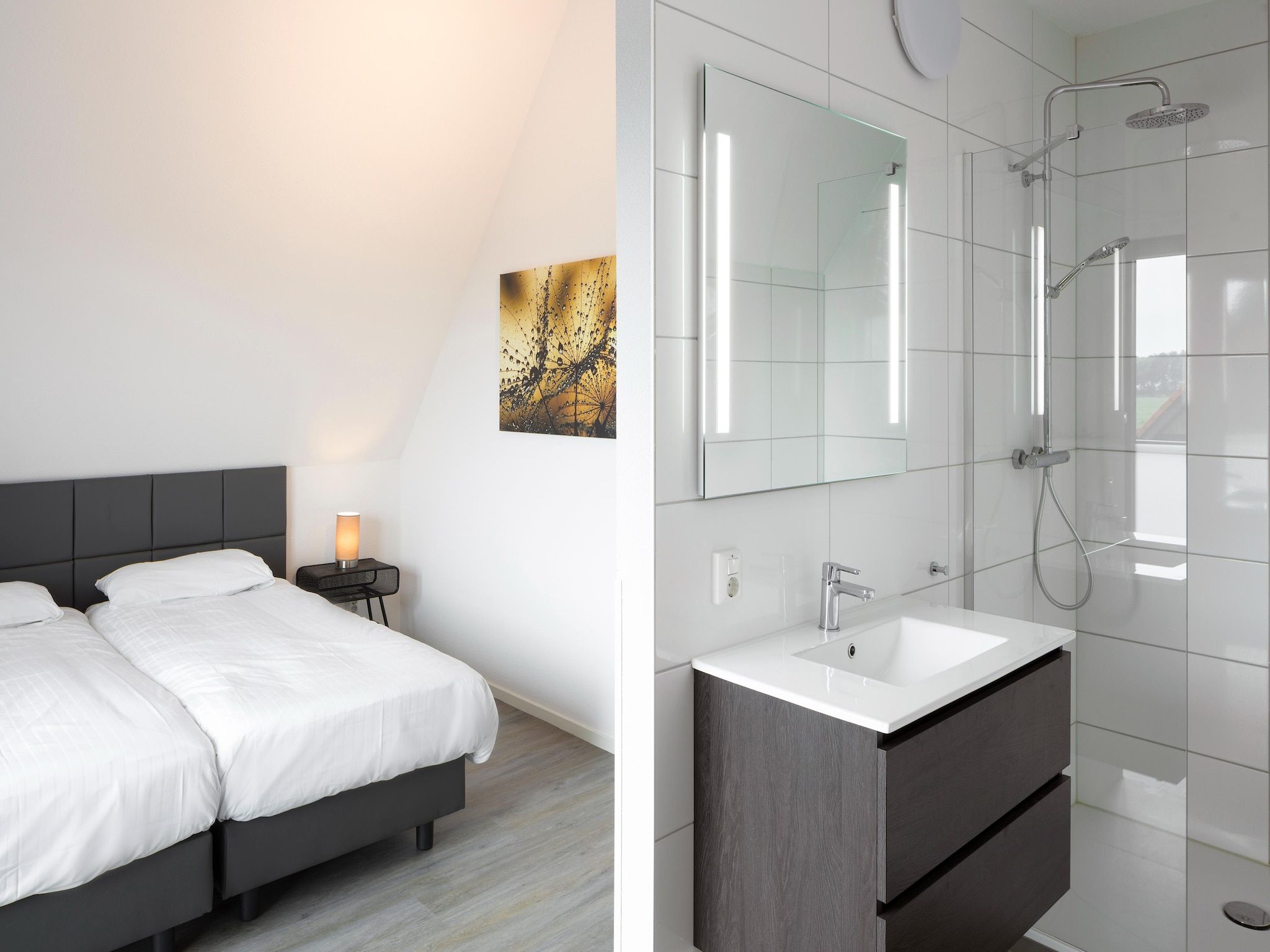 Een slaapkamer van Waterstaete Ossenzijl 4 in Ossenzijl