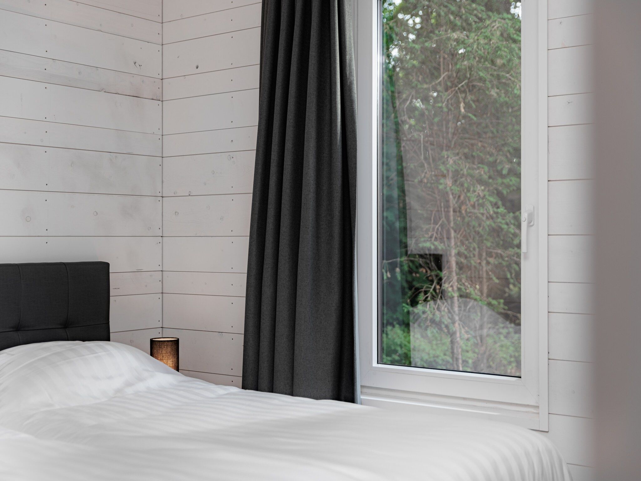 Een slaapkamer van Vakantiepark Schaijk 10 in Schaijk