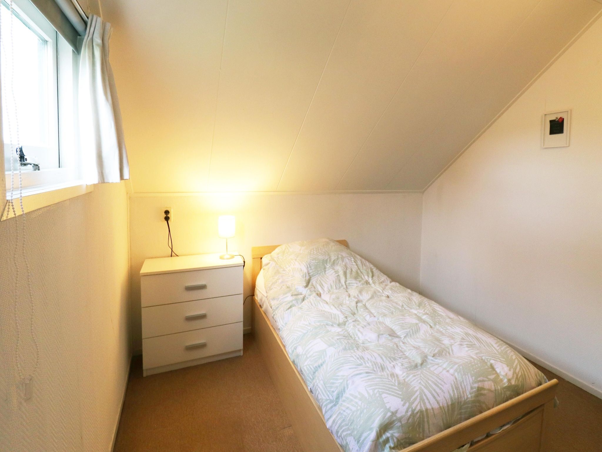 Een slaapkamer van De Kerkereed in Donkerbroek