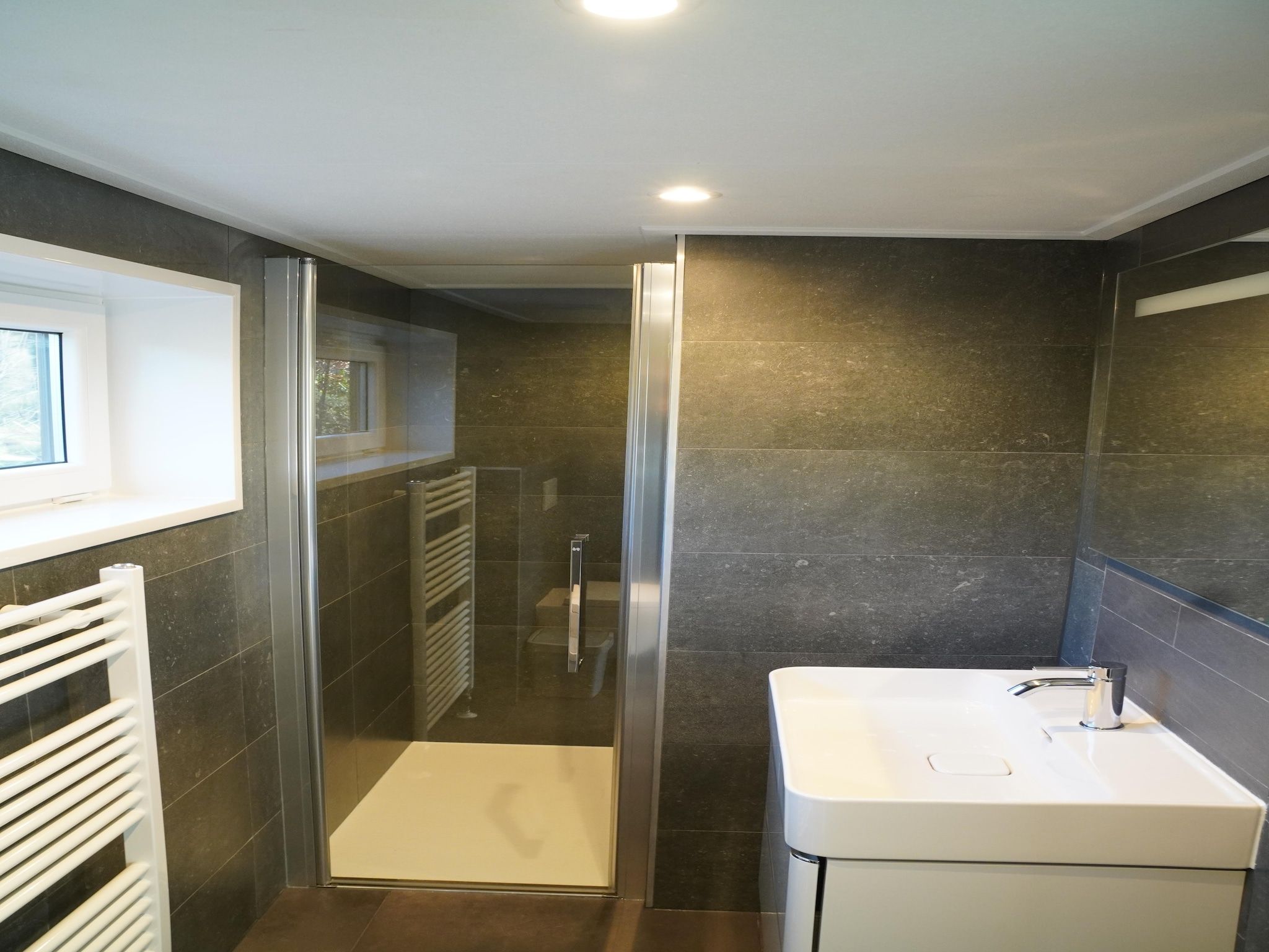 De badkamer van Vakantiepark De Rimboe & De Woeste Hoogte 41 in Hoenderloo