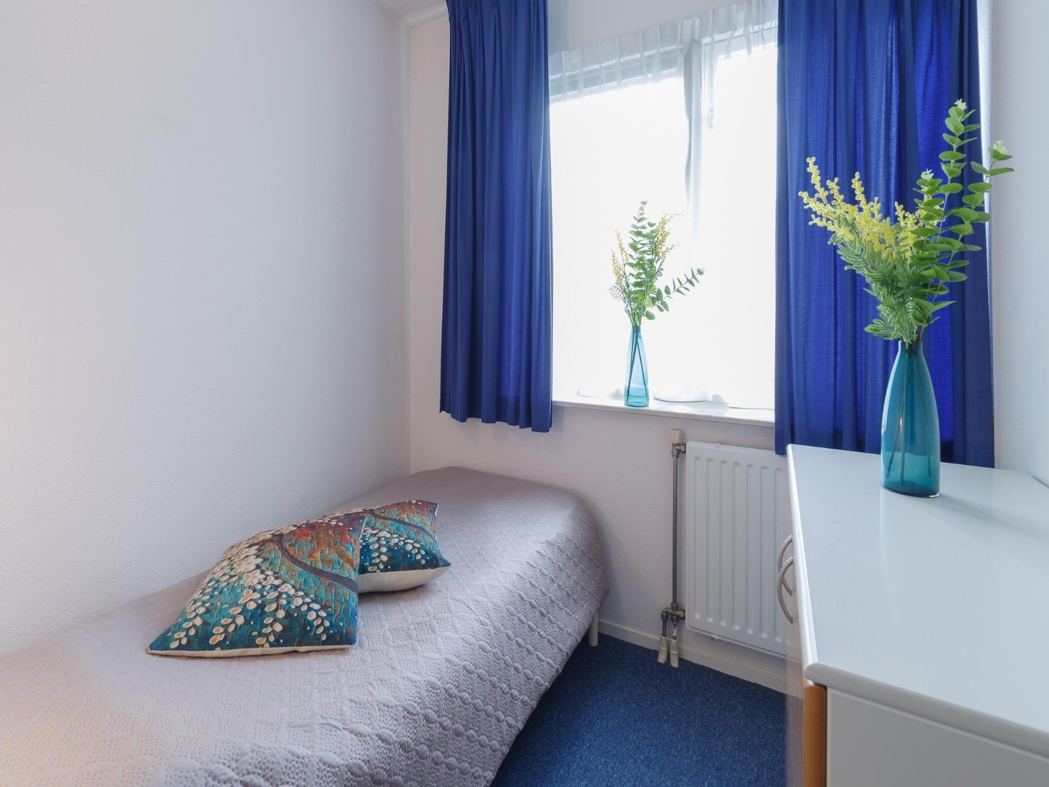 Een slaapkamer van Villapark De Oesterbaai 6 in Wemeldinge