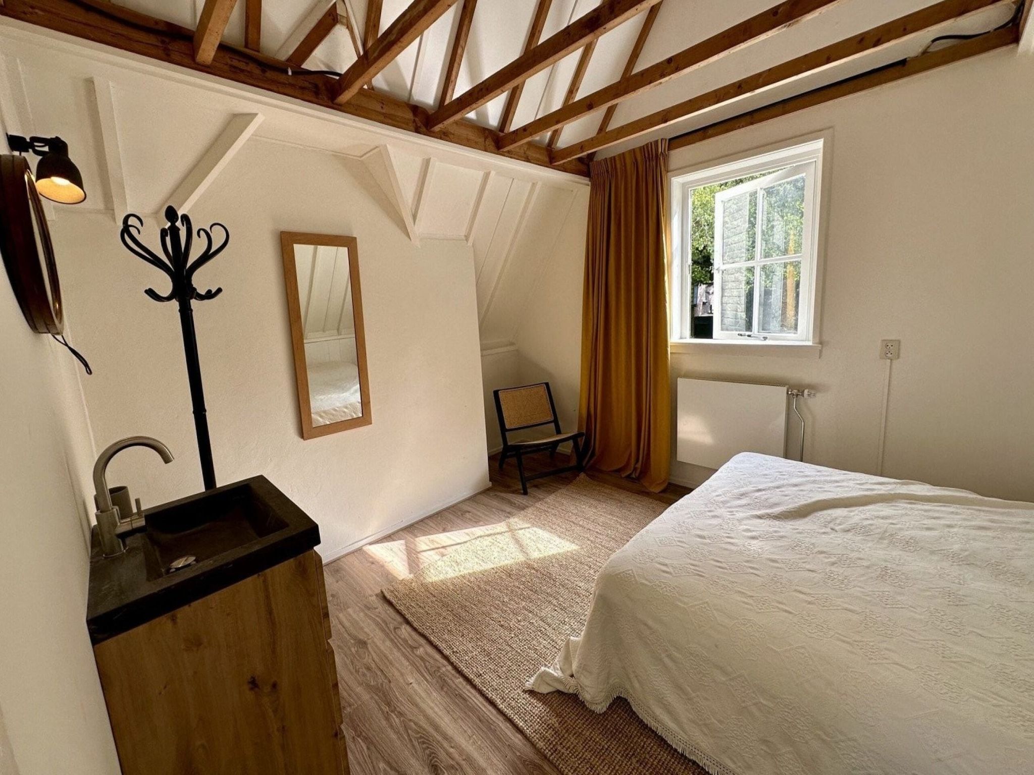 Een slaapkamer van Vakantiehuis Fijn in Bergen