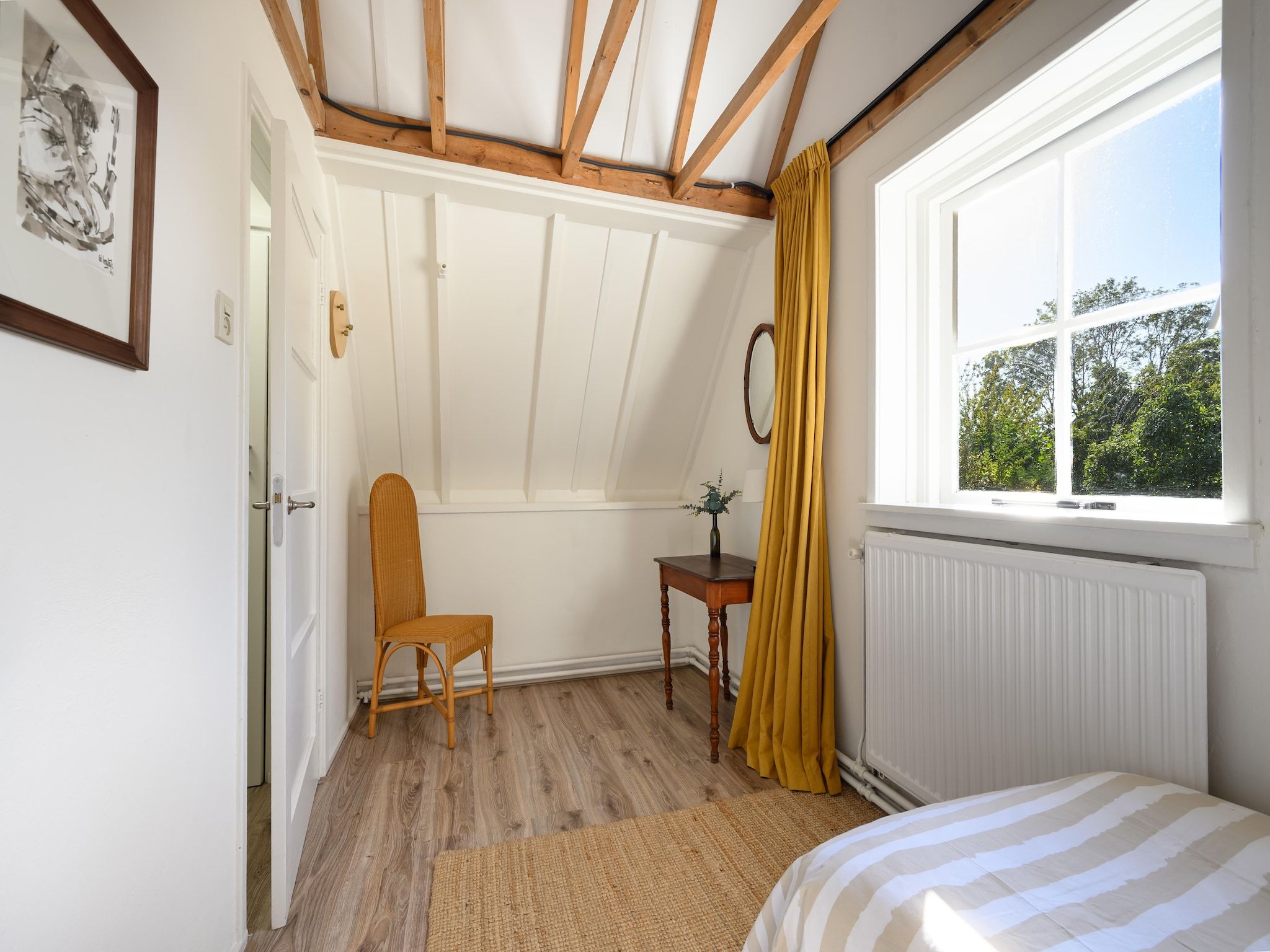 Een slaapkamer van Vakantiehuis Fijn in Bergen