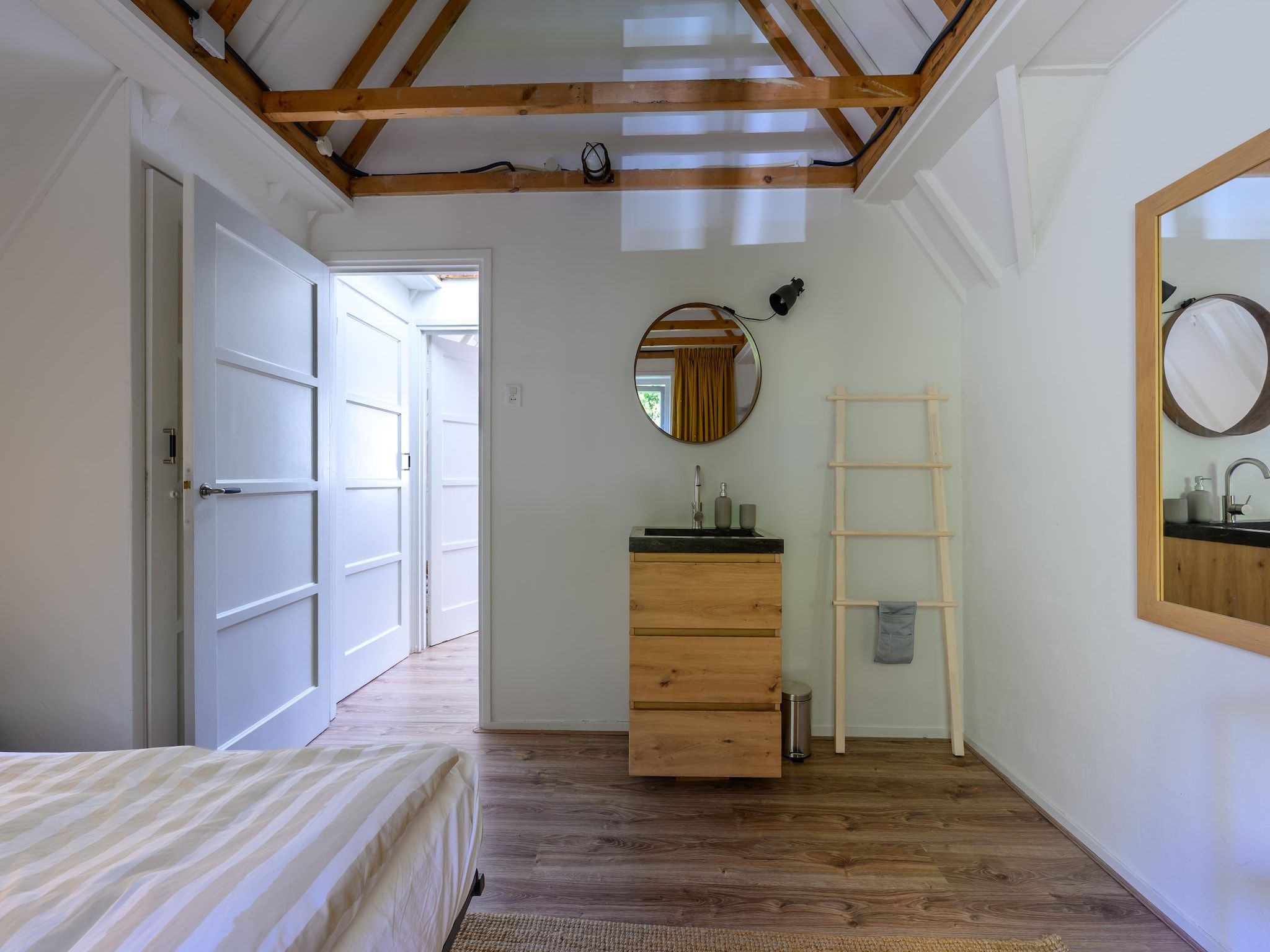 Een slaapkamer van Vakantiehuis Fijn in Bergen