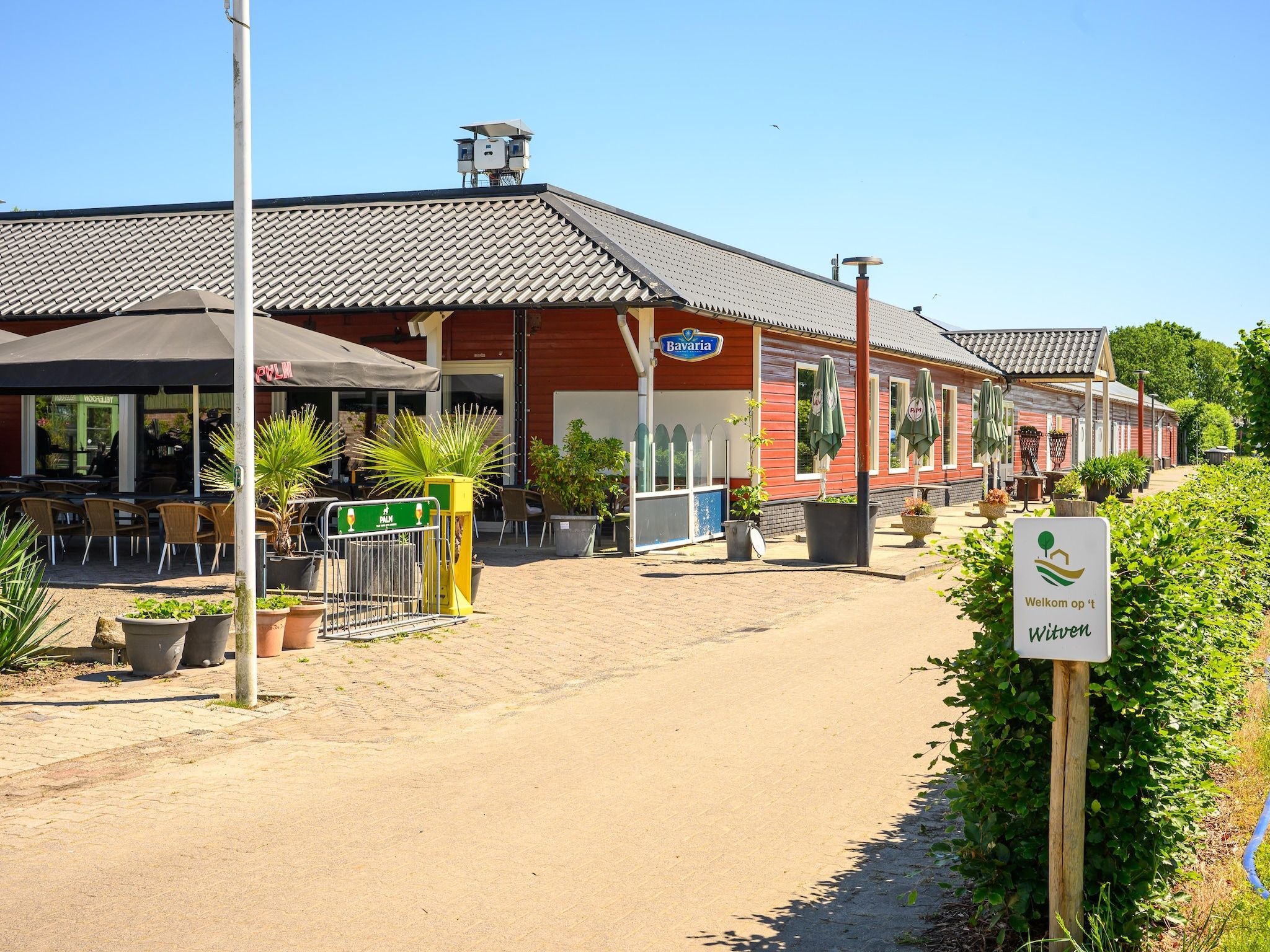 De buitenkant van Vakantiehuisje 20 in Someren-Heide