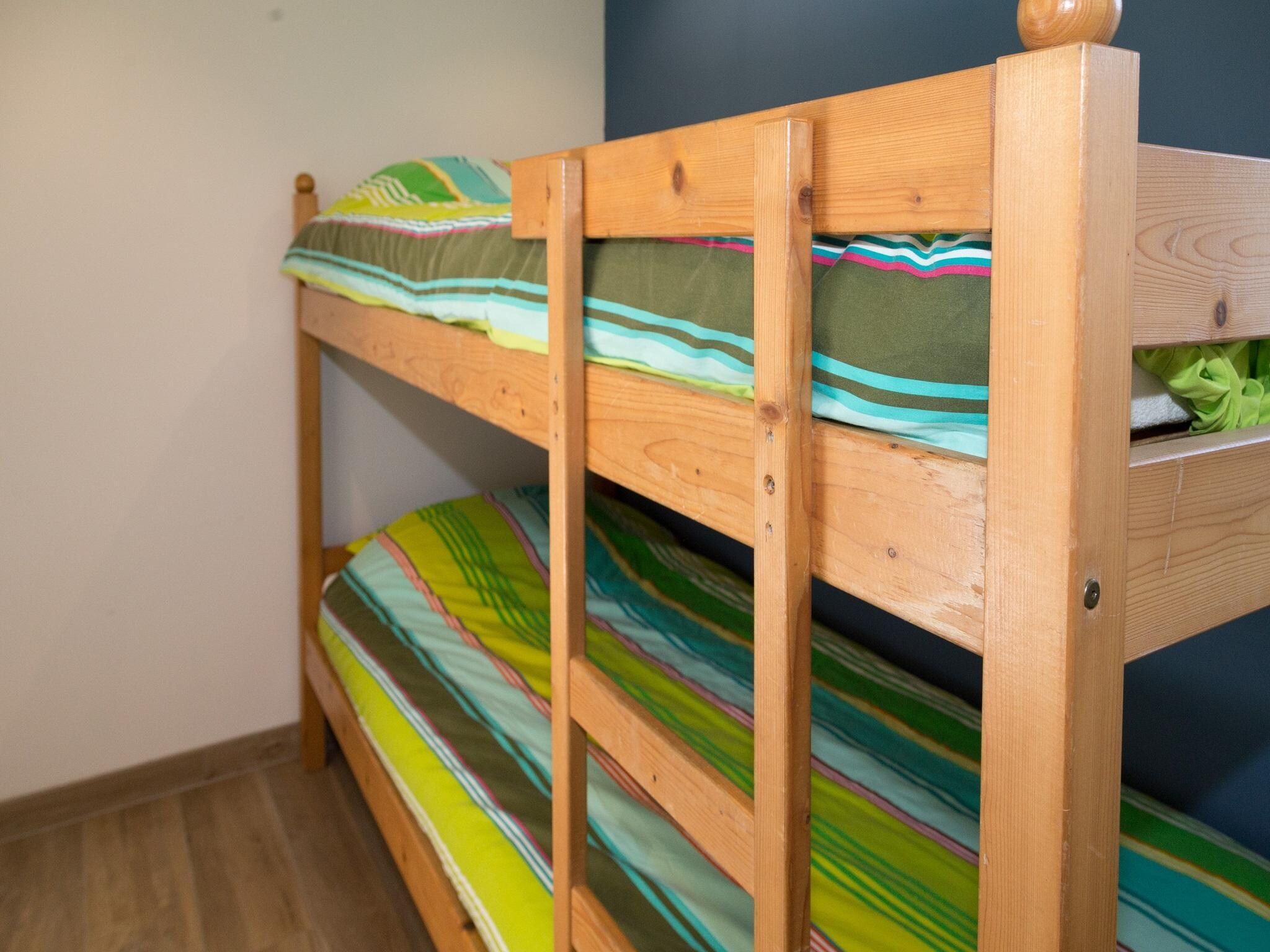 Een slaapkamer van Kustwoning Baarland in Zeeland in Baarland