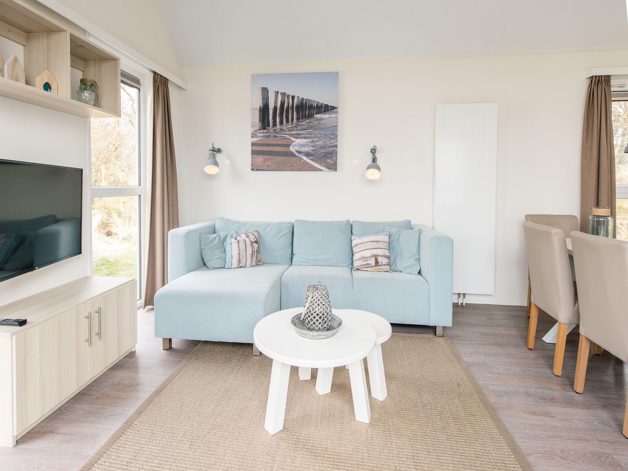 De woonkamer van Vakantiepark Boomhiemke 19 in Hollum