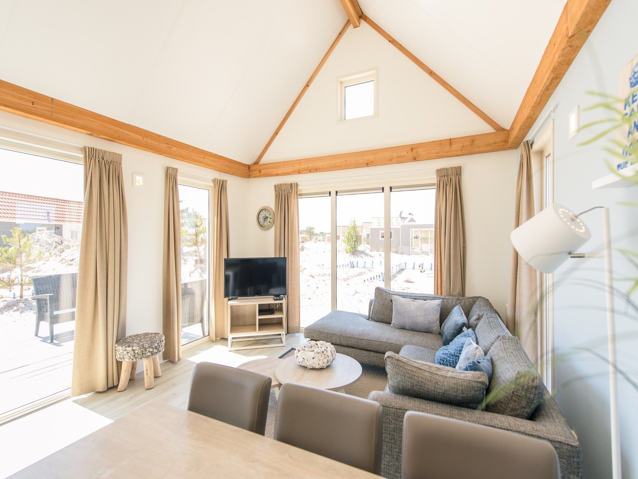 De woonkamer van Vakantiepark Boomhiemke 20 in Hollum