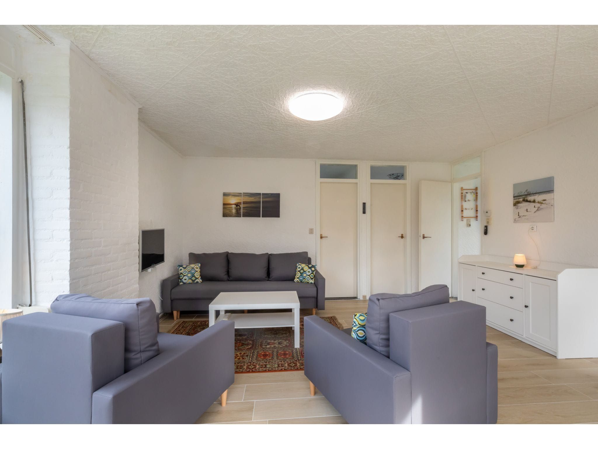 De woonkamer van Koekoesbloemwei 90 in Kortgene