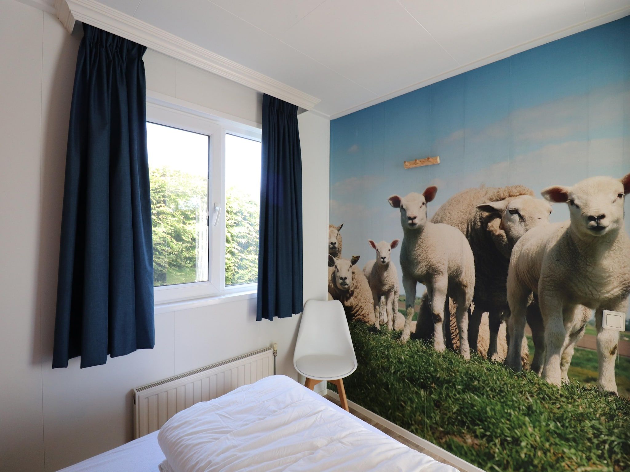 Een slaapkamer van De Lanterfanter in Grou
