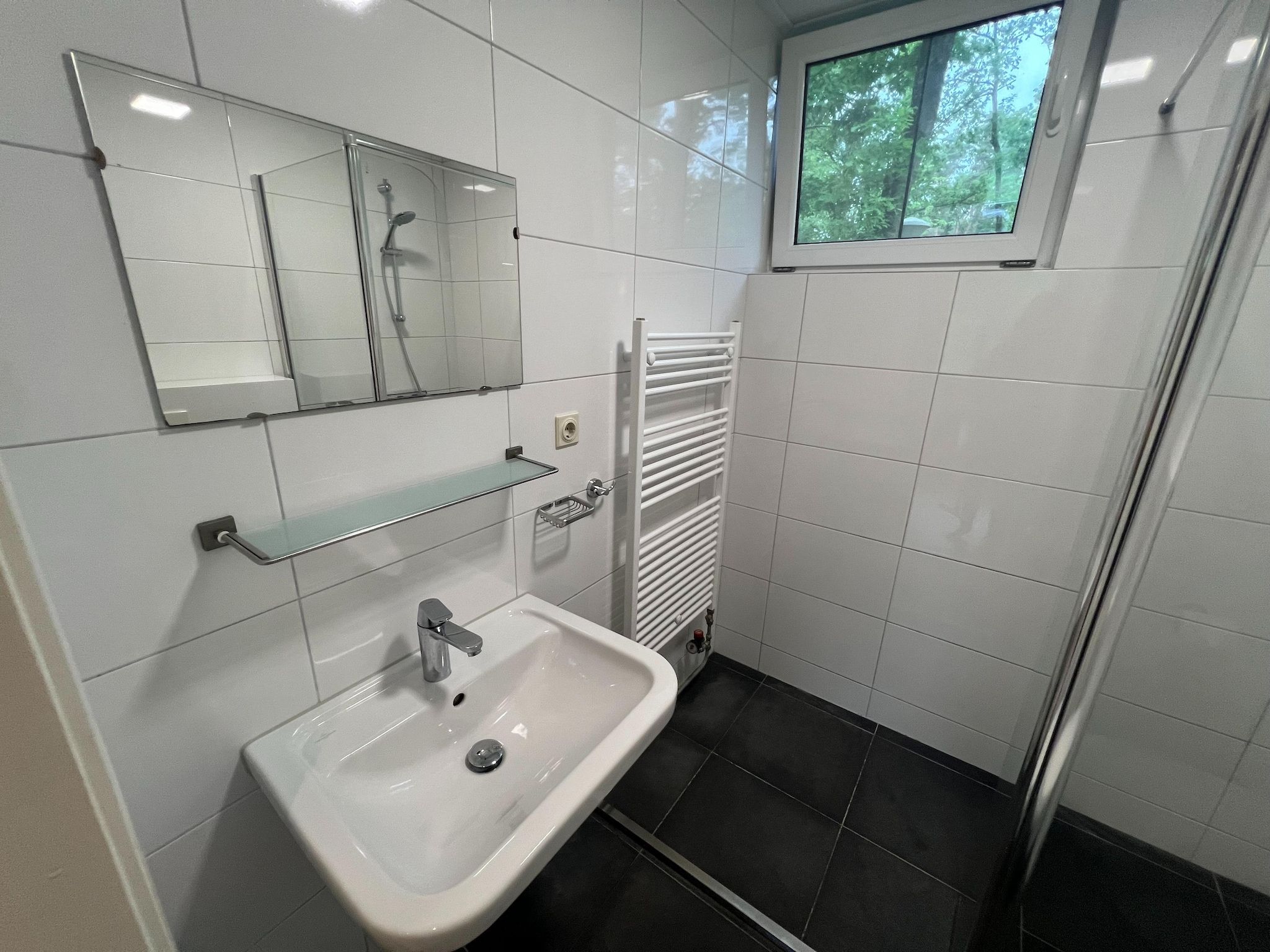 De badkamer van Combi bungalow Vosseven 84 & 85 in Stramproy