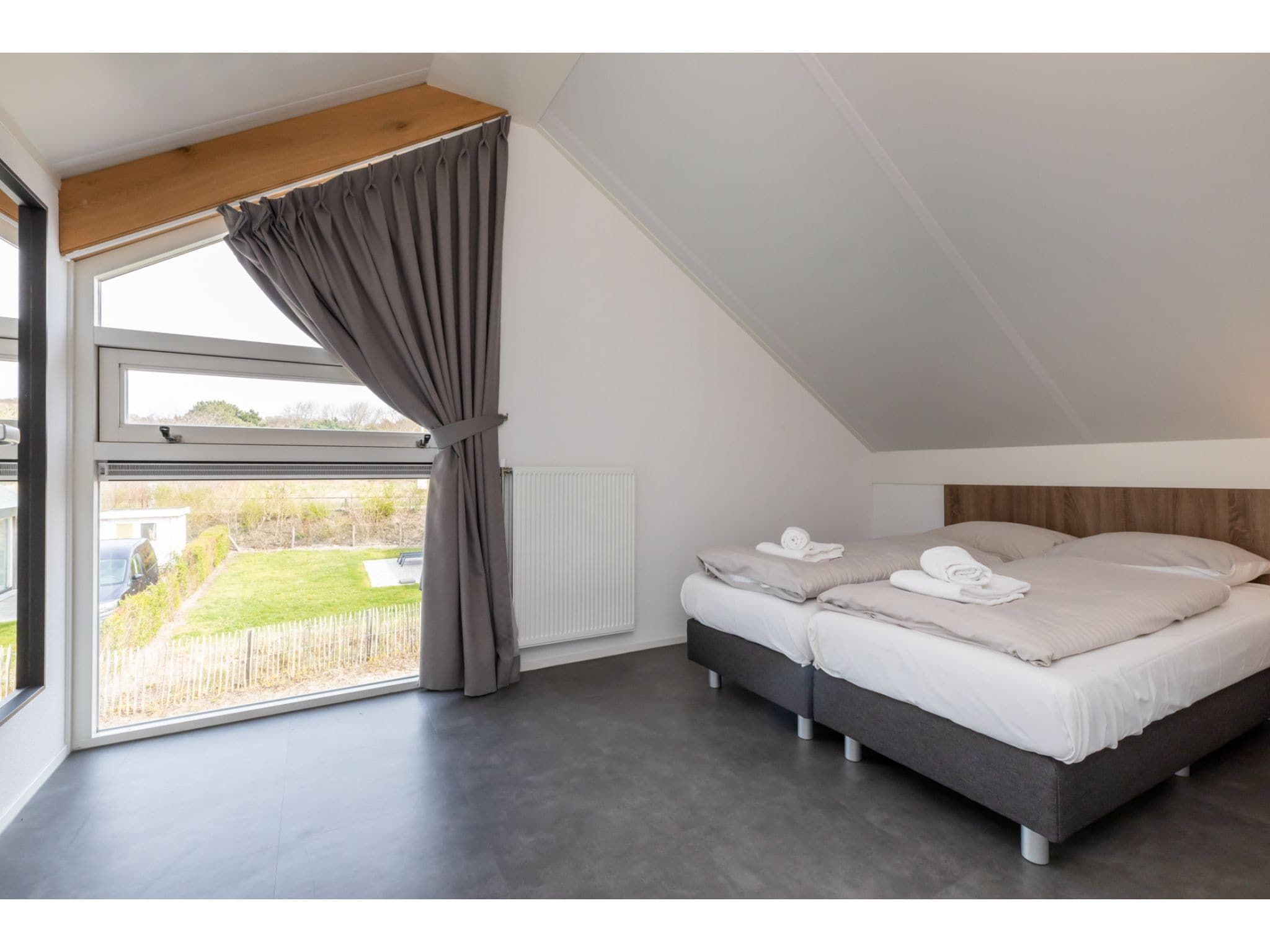 Een slaapkamer van Strandvilla 30 in Renesse