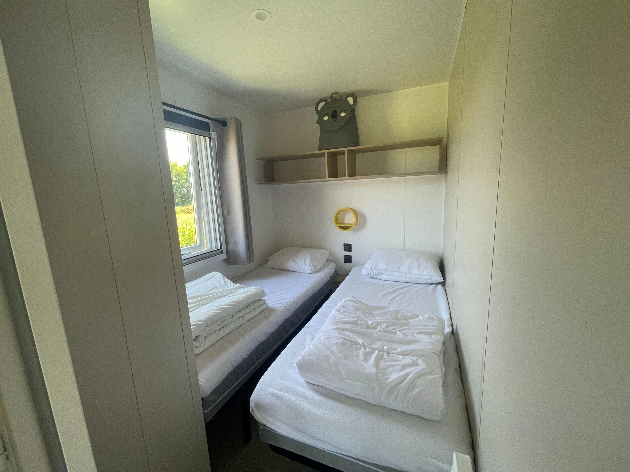 Een slaapkamer van Elperhof Veldlodge in Schoonloo