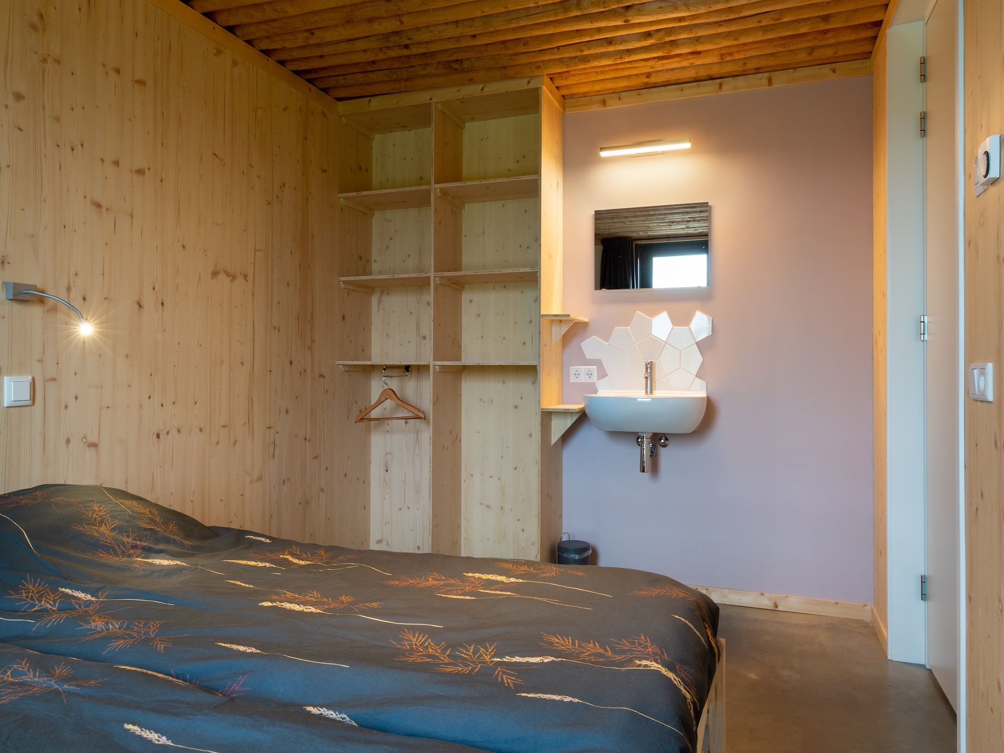 Een slaapkamer van Koe in de Kost 4 in Heeten