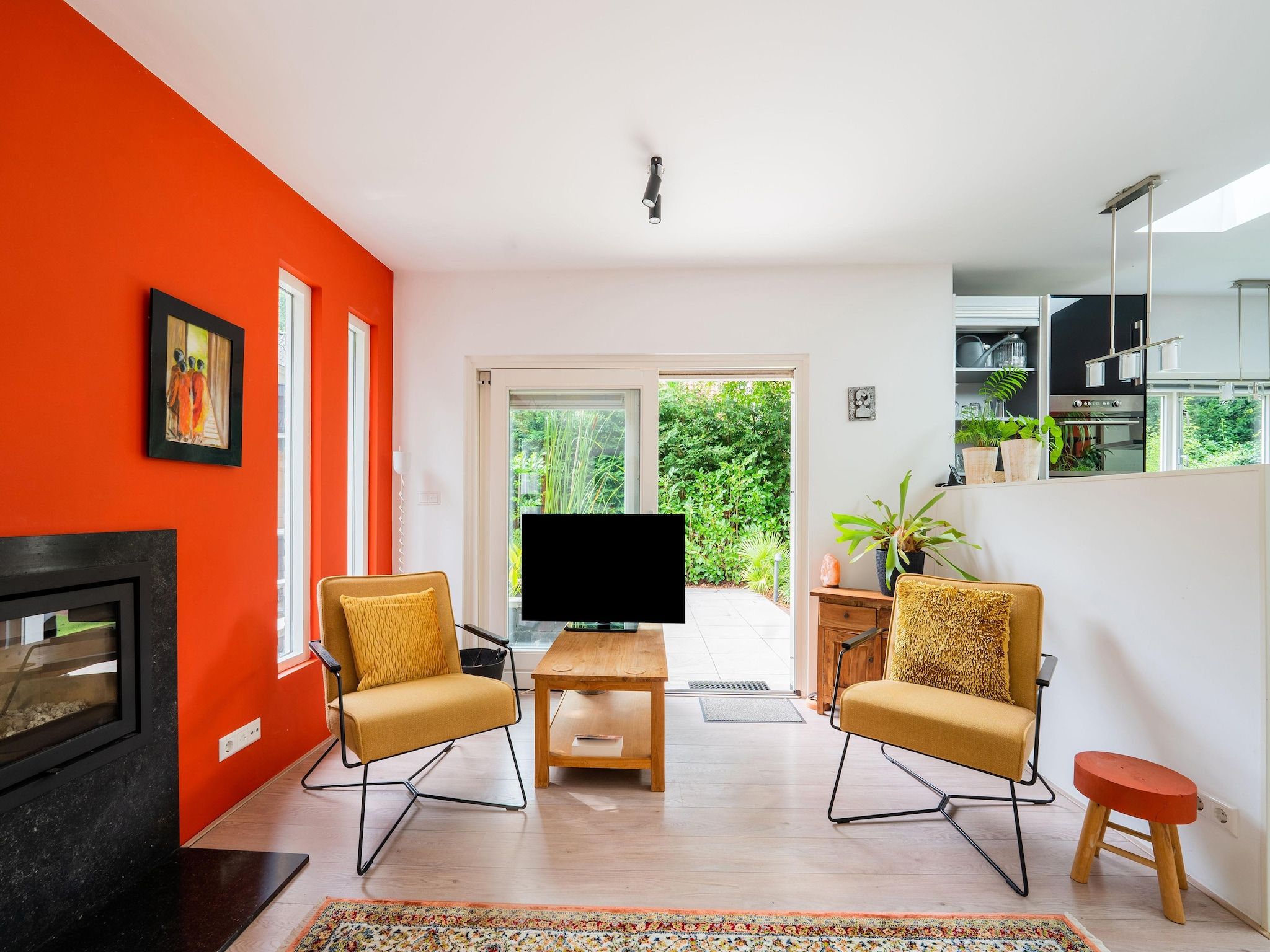 De woonkamer van De Klimroos in Bergen